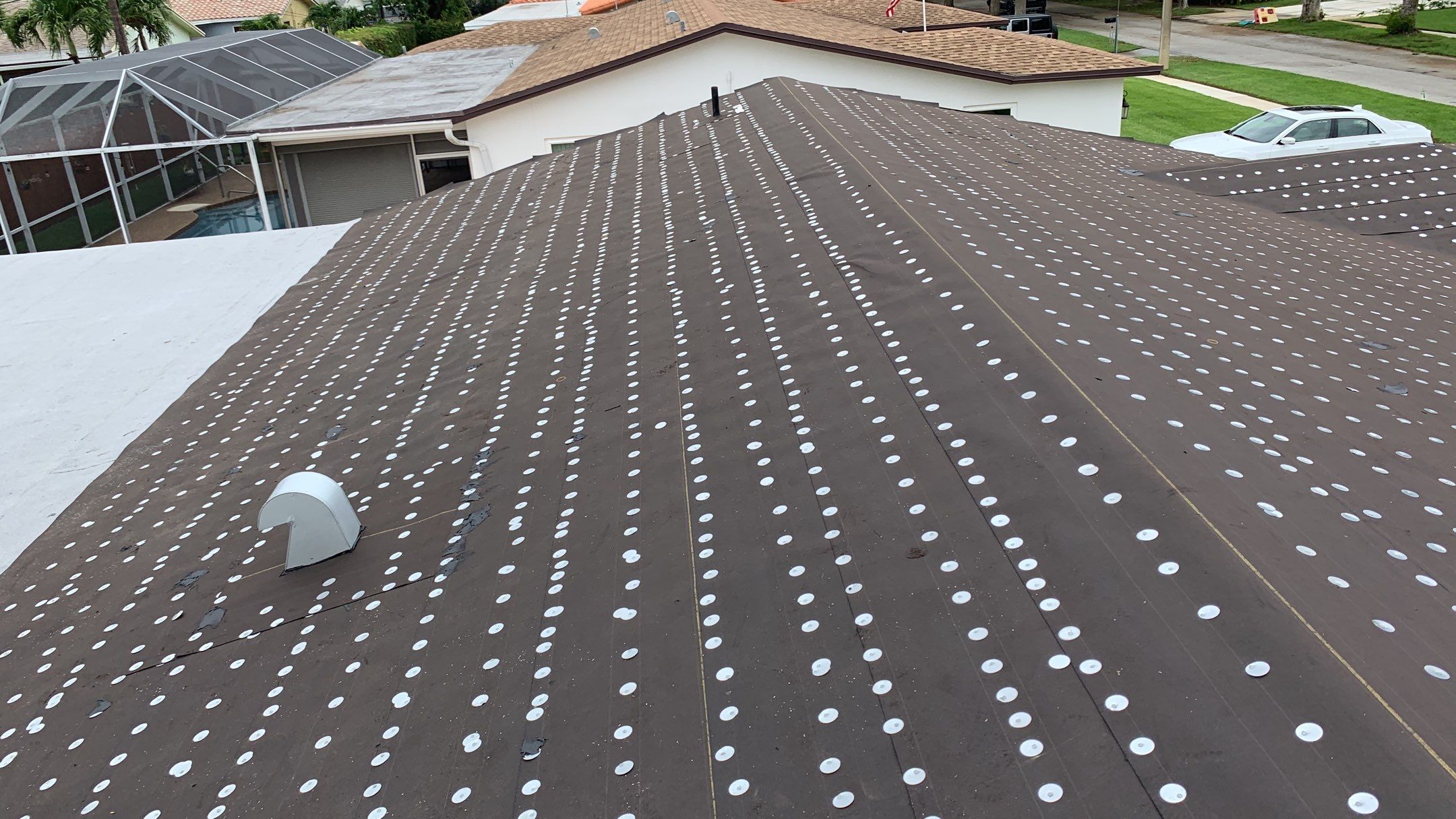 Residential Roofing Installation using 1" Nail strip metal roof by BLUES BROTHERS ROOFING