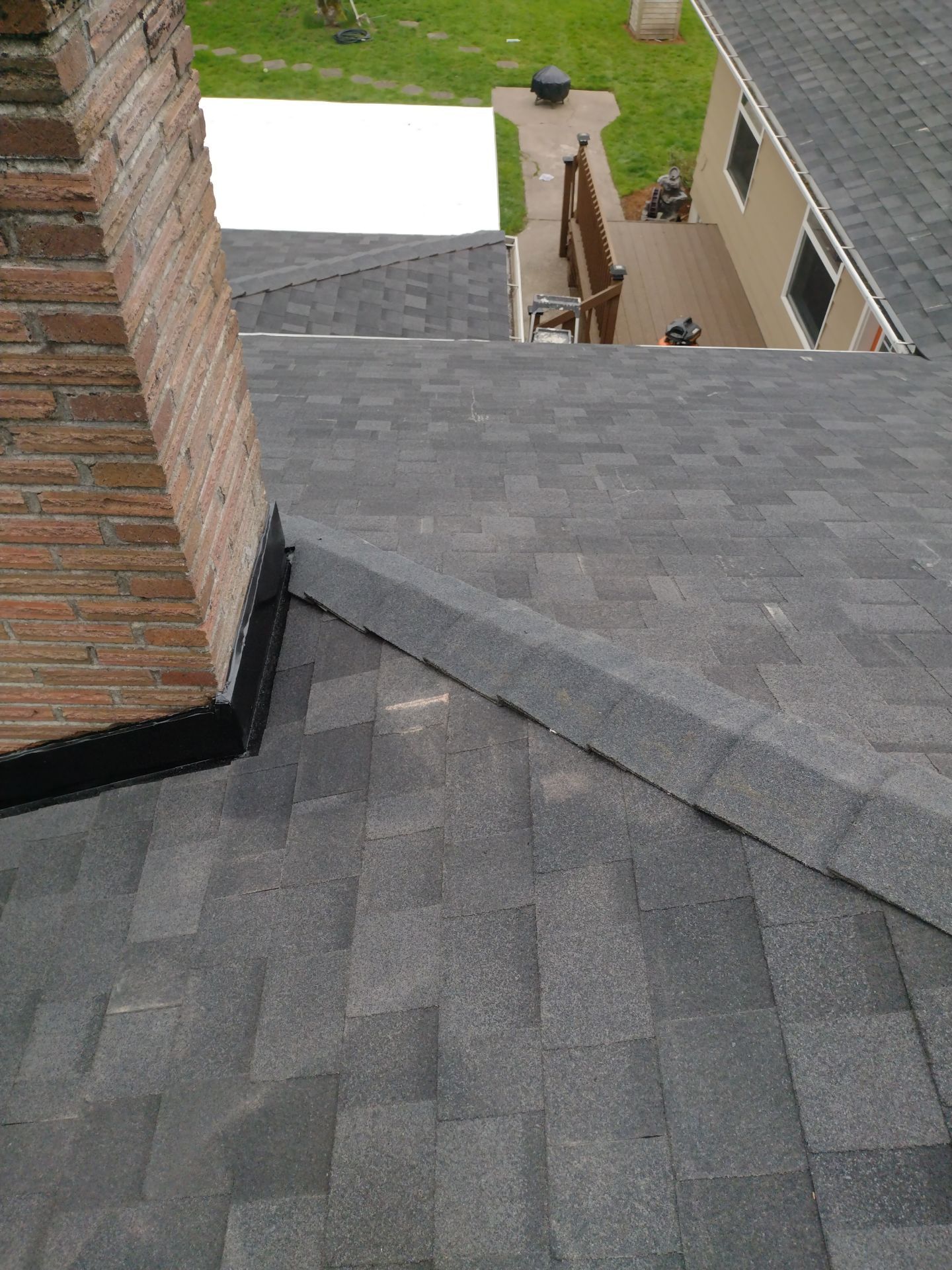 Residential Roofing Installation using IKO Dynasty (Color: Granite Black) by Orezona Building & Roofing Company, Inc.