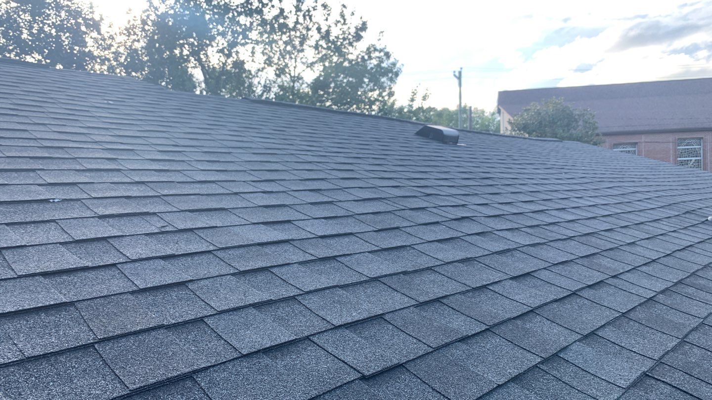 Hail Damage using Atlas Pristine Pinnacle Shingles by Artigues Roofing & Restoration Services