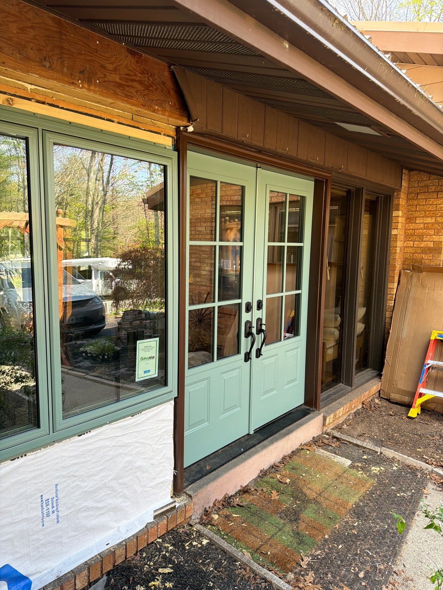 Sage Green Entry Door Replacement and Window Installation in Lykens by Esh Builders