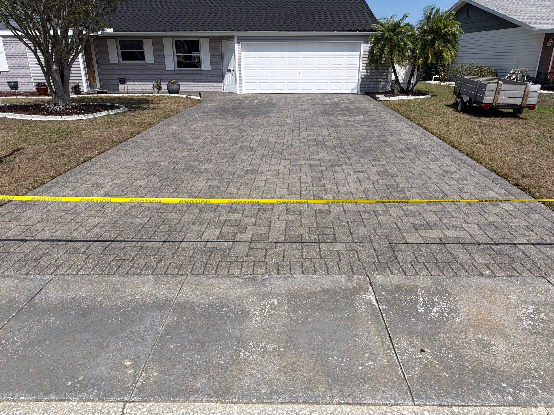 Paver Sealing and Restoration for Sun City Center Driveway by Supreme Paver Experts