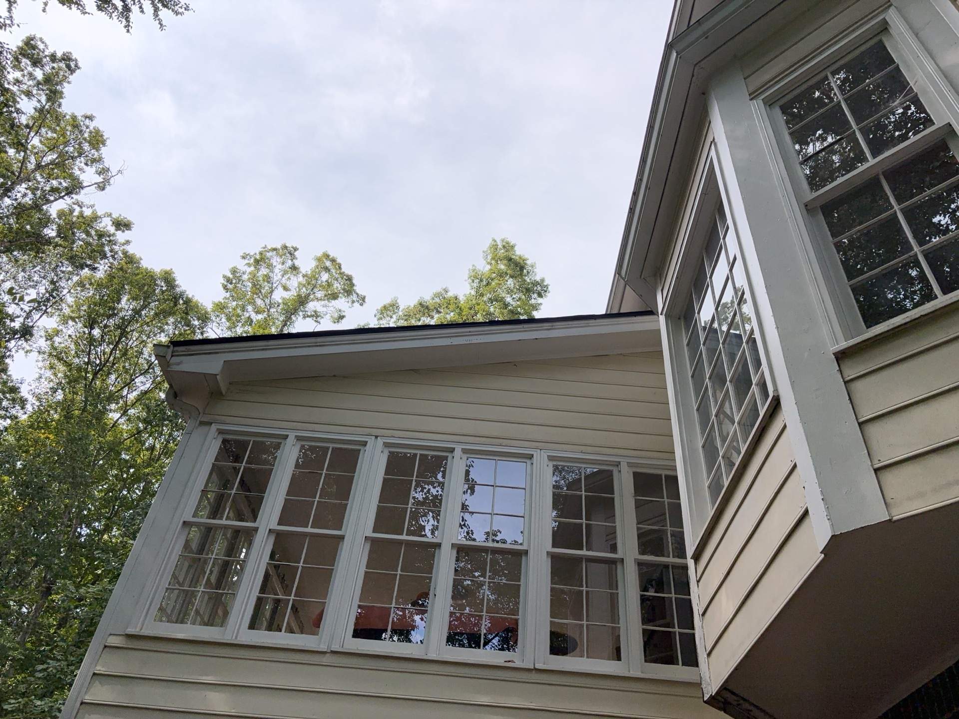 53 Window Replacements with Master 2800 Series Vinyl Replacement Windows and James Hardie Siding Installation by Nelson Exteriors 