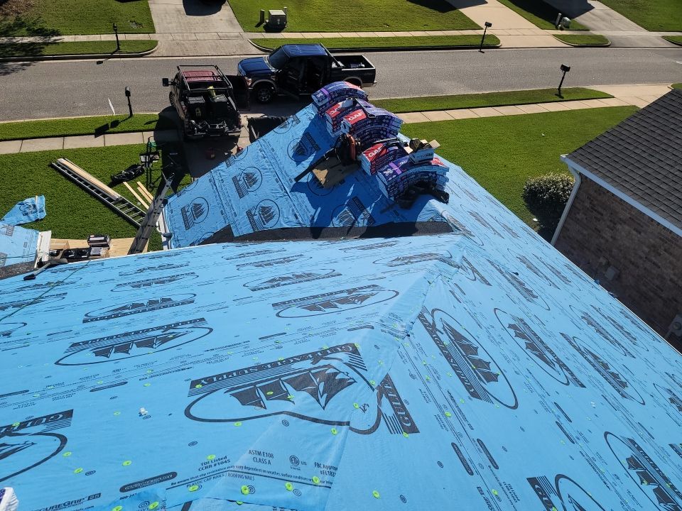 Residential Roofing Installation using Roof Replacement by American Roofing & Construction LLC