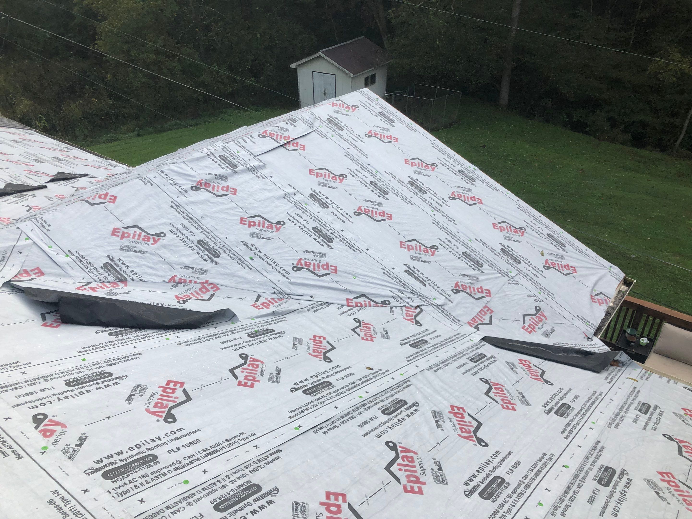 Metal Roof and Vinyl Siding, Soffit, Gutters using LifeTite Premium metal roofing  by Secure Construction Company Inc