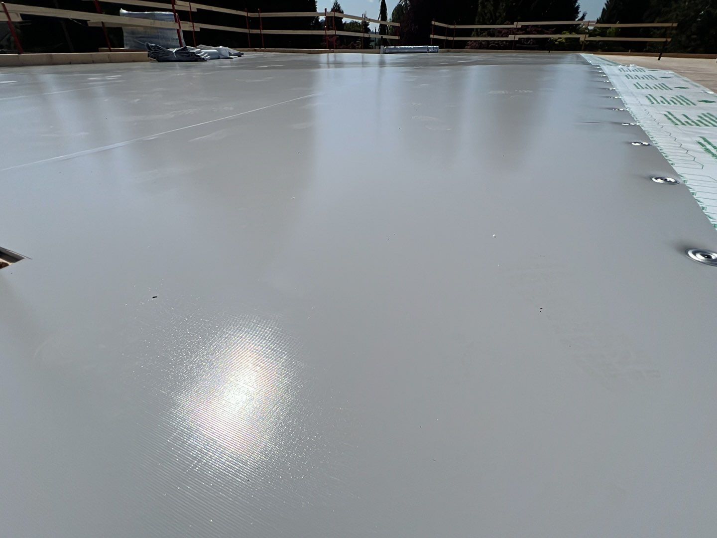 Residential Roofing Installation using Durolast roofing membrane by Top Notch Roofing Inc