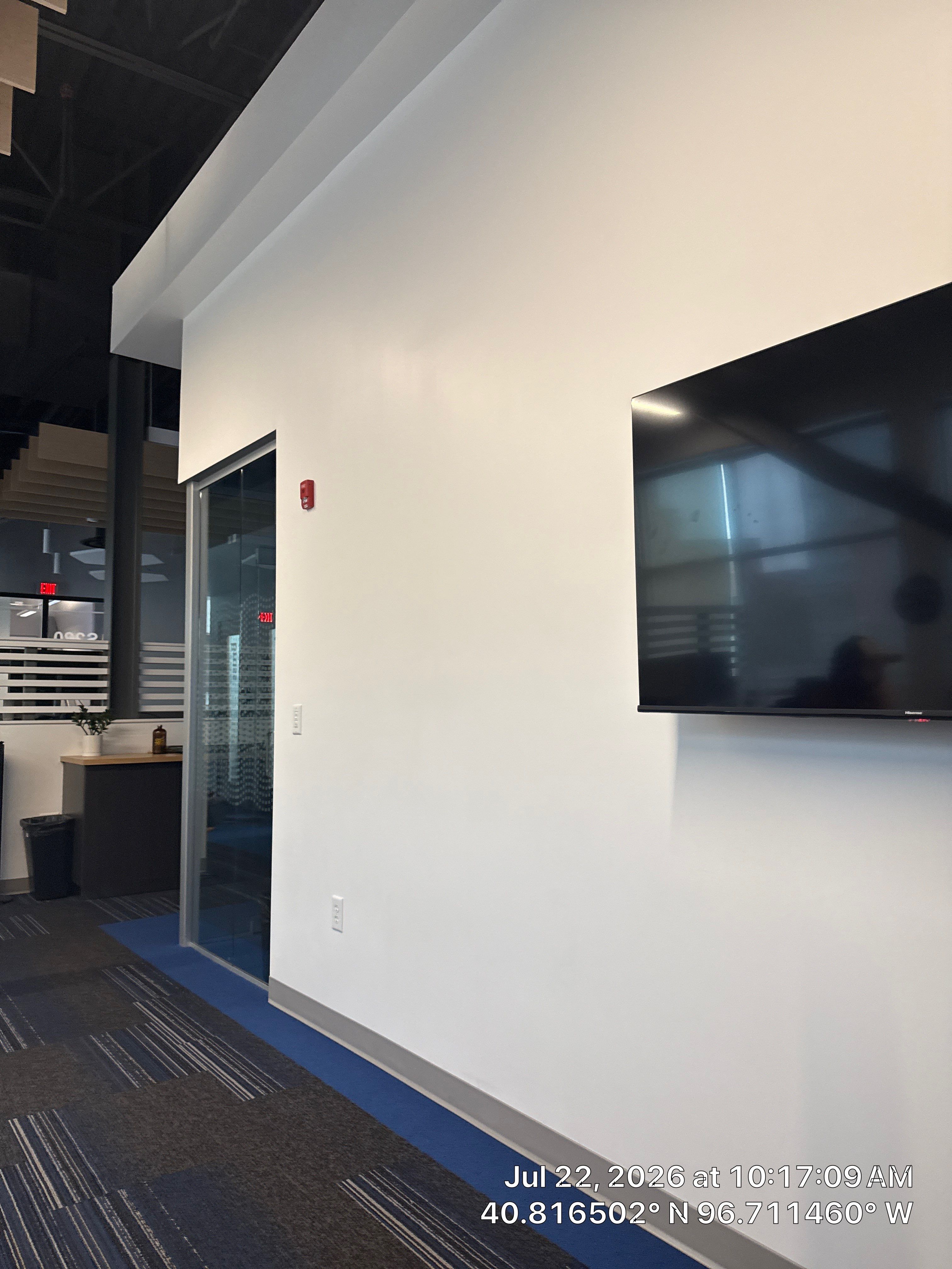 Modern Office Interior Renovation and Acoustic Baffle Installation by CompanyCam Sales Demo