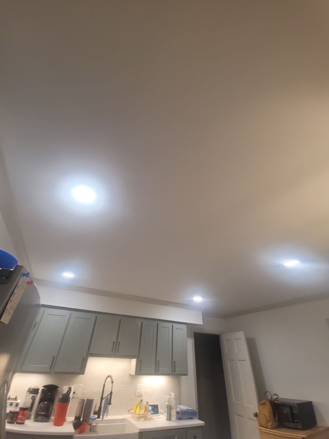 A Pathway to Personality – A Two-Tone Kitchen Transformation in Apex by Elite Remodeling and Design LLC