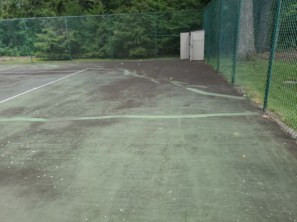 Tennis court cleaning by Northern Power Washing LLC.
