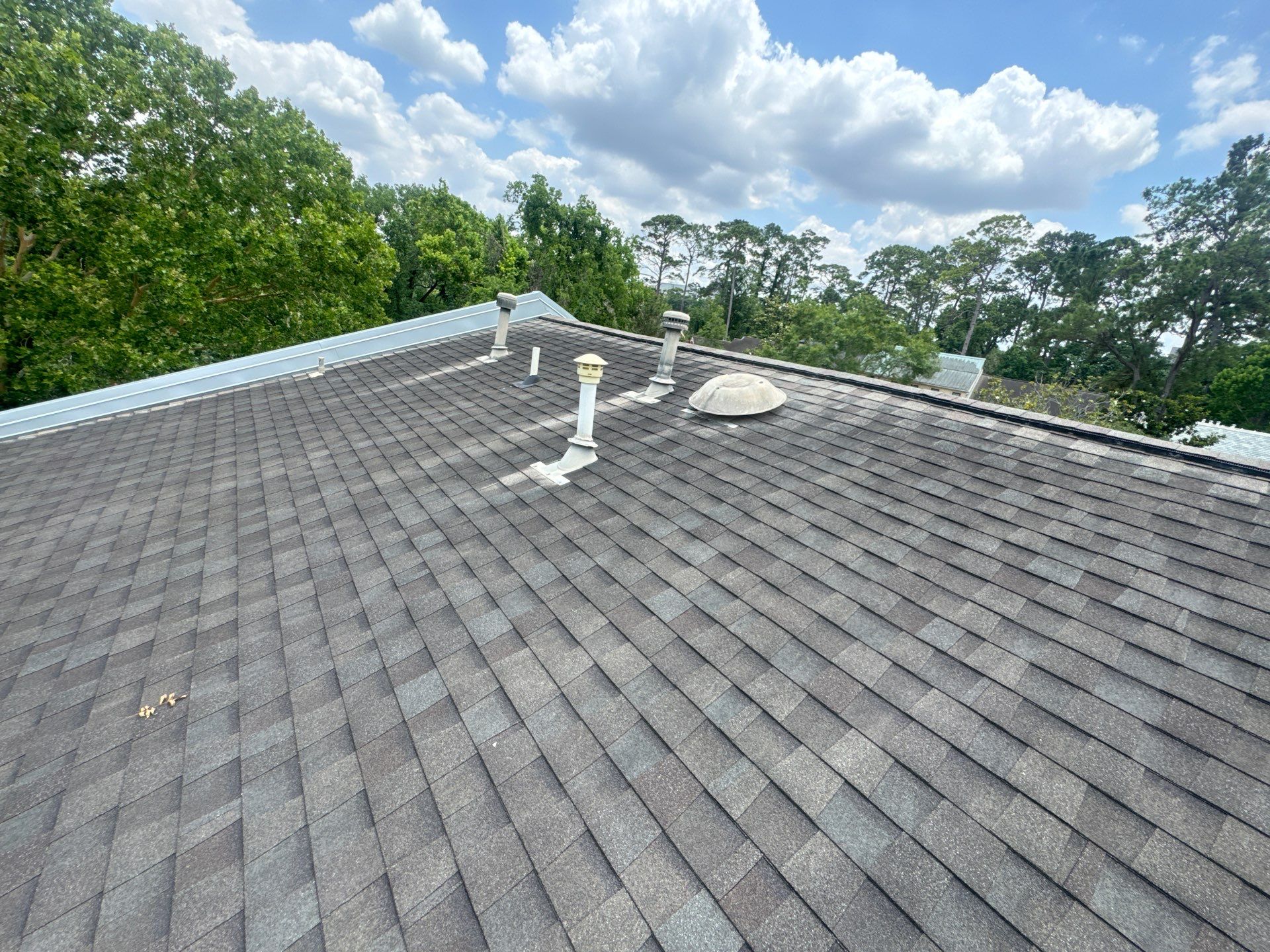 Chimney Leak Repair & Skylight Leak Repair  by Associates Roofing Unlimited 