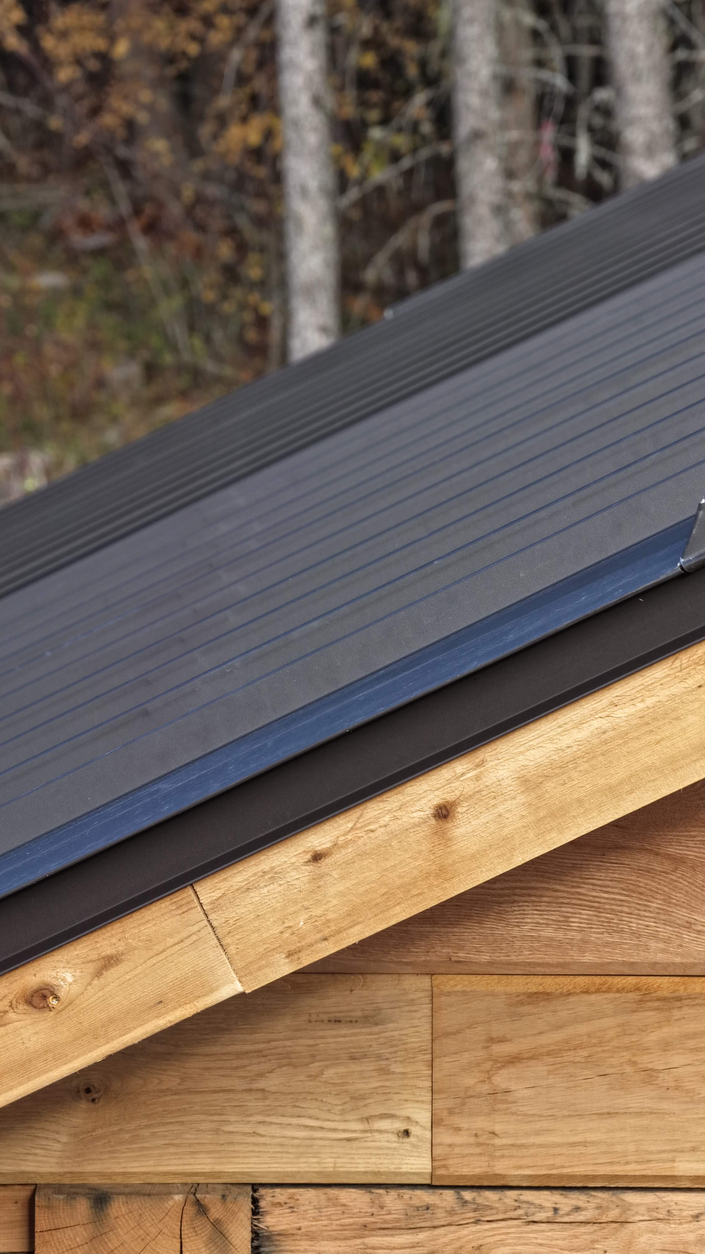 Mechanical Lock Standing Seam - CMG ULG Dark Bronze  by Montana Roofing Solutions