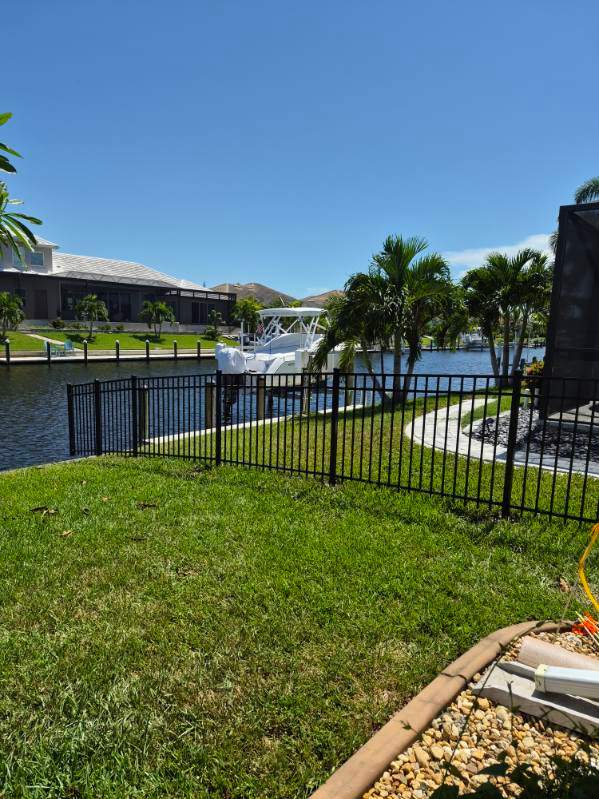 Custom Black Aluminum Fence Enclosure for Punta Gorda Waterfront Property by True Fence LLC