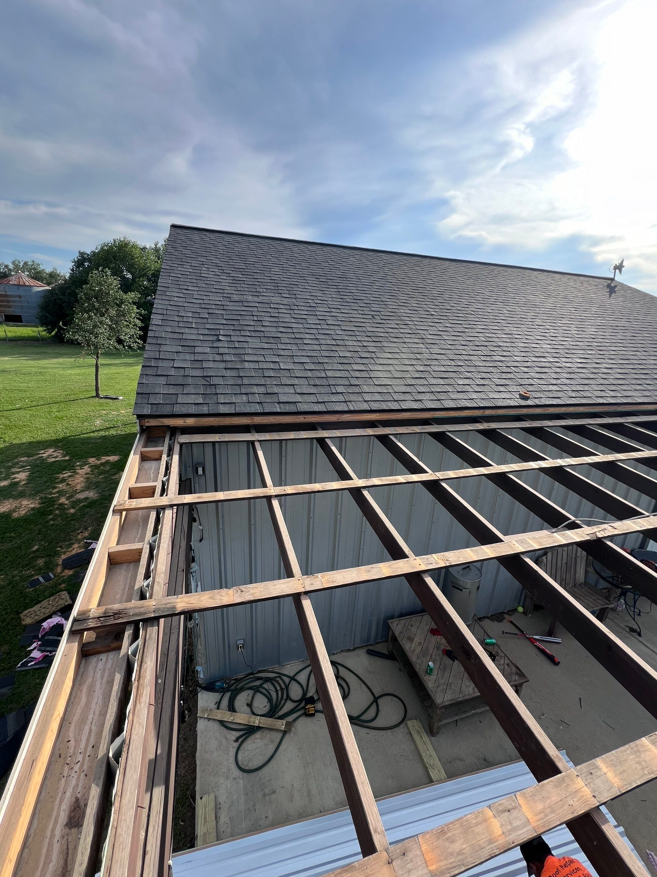 Residential Roofing Installation using Metal by Roof Repair Company