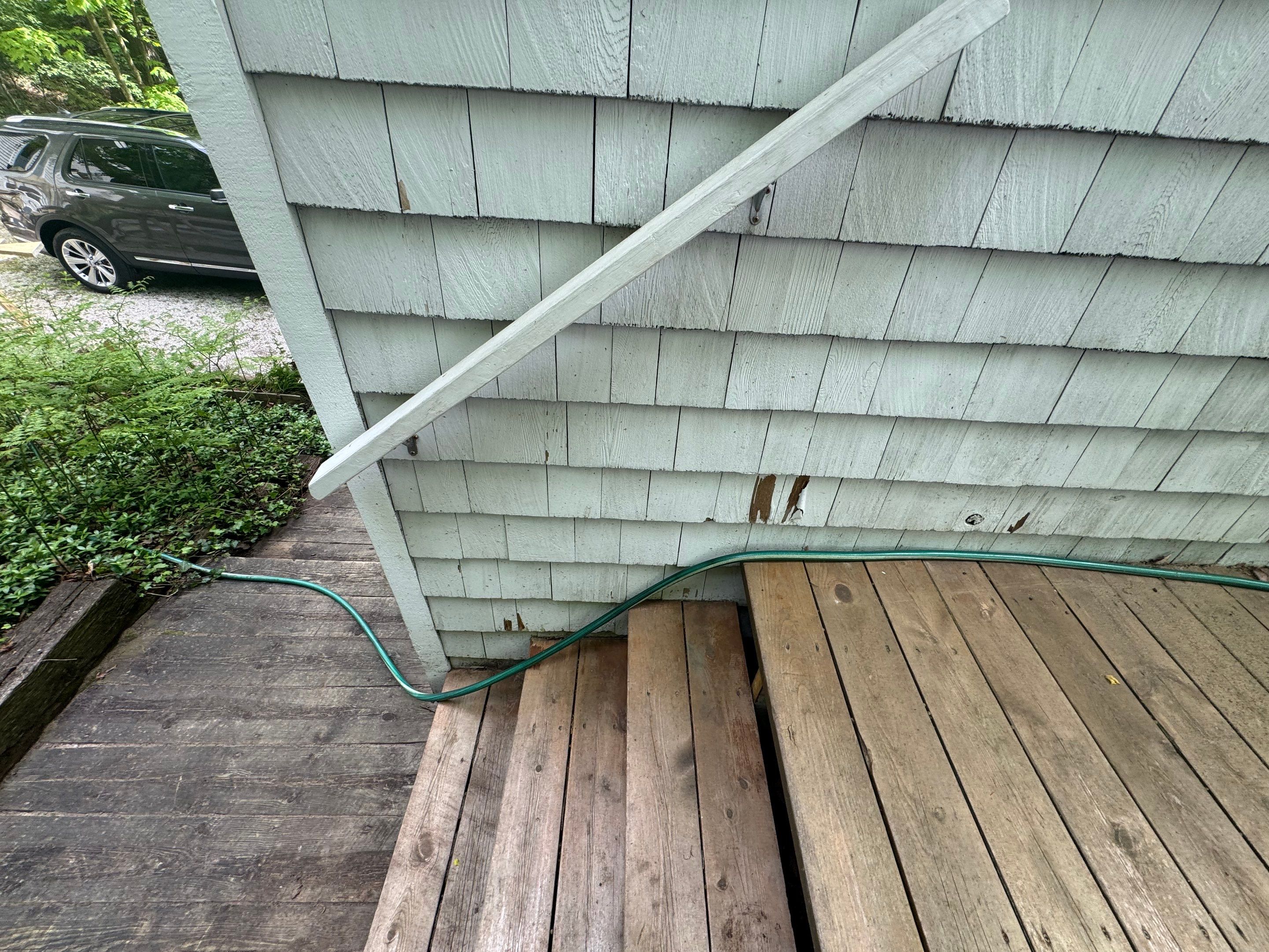 Lakefront Deck Pressure Washing, Exterior Wood Staining, and Painting in West Olive MI by Gordon Painting