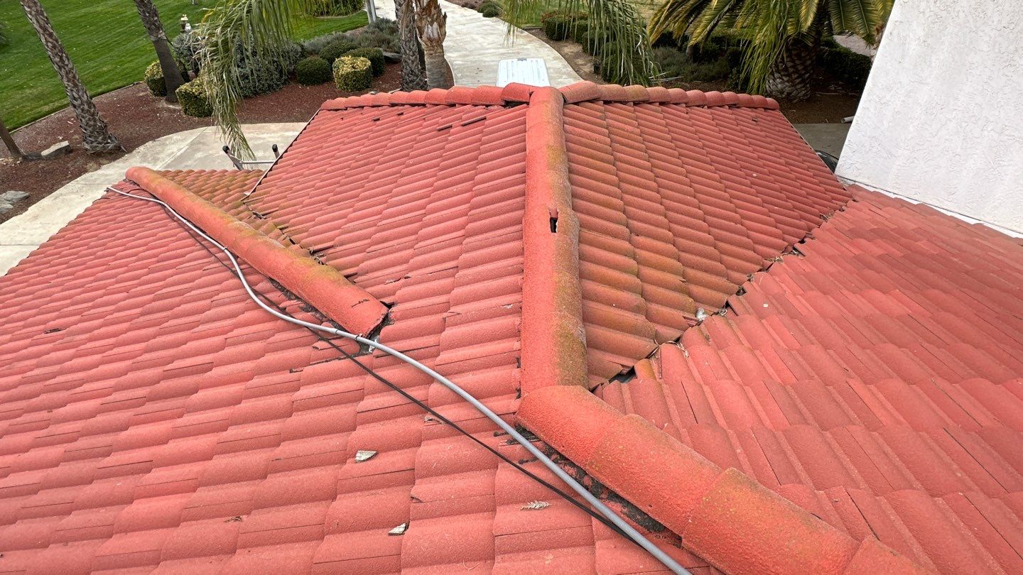 Tile refurbish project using existing tiles and replaced underlayment and battens by Straight Edge Roofing Inc