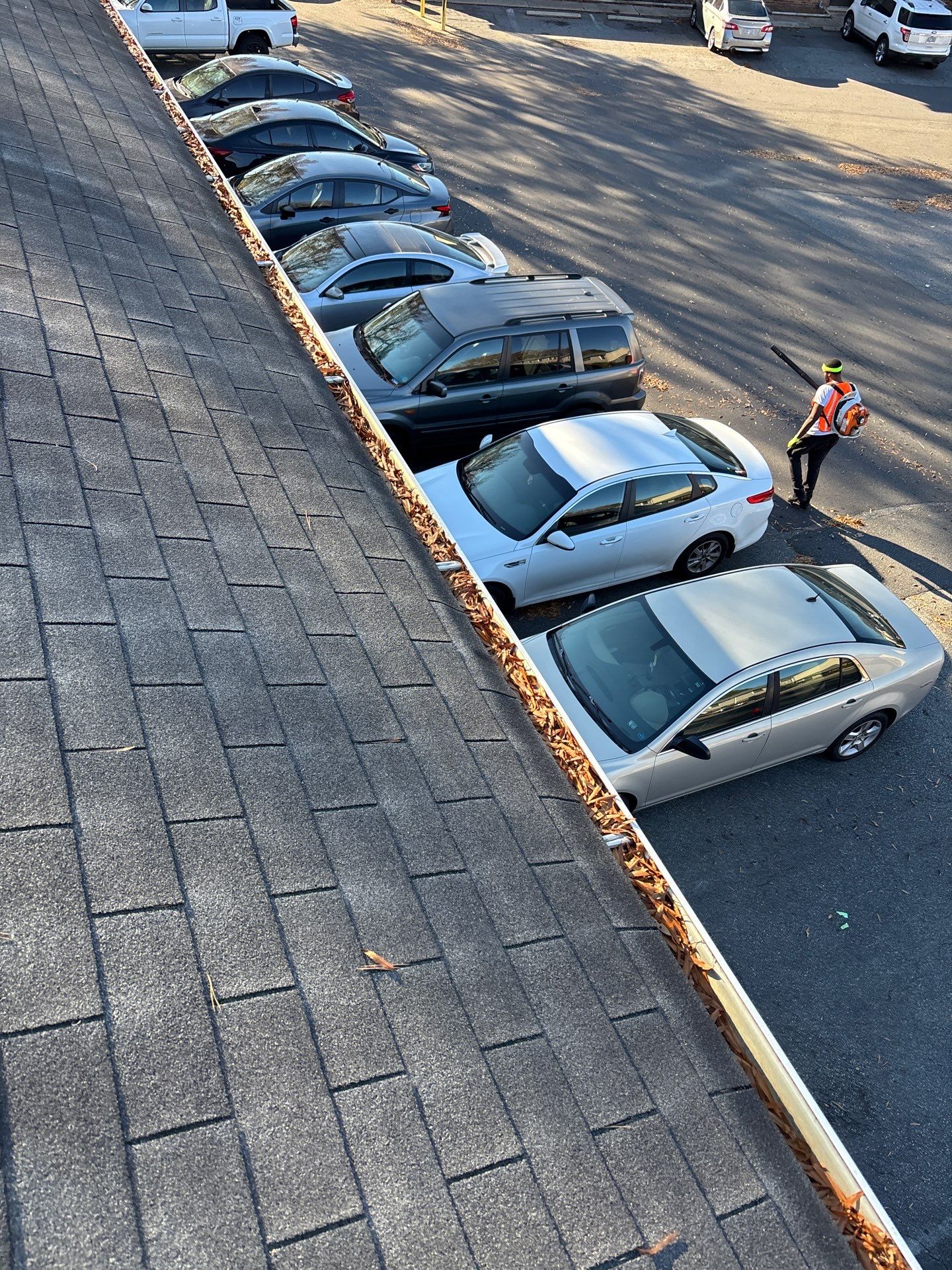 Commercial gutter cleaning Indian Trail & Matthews, NC before photo with filled gutters