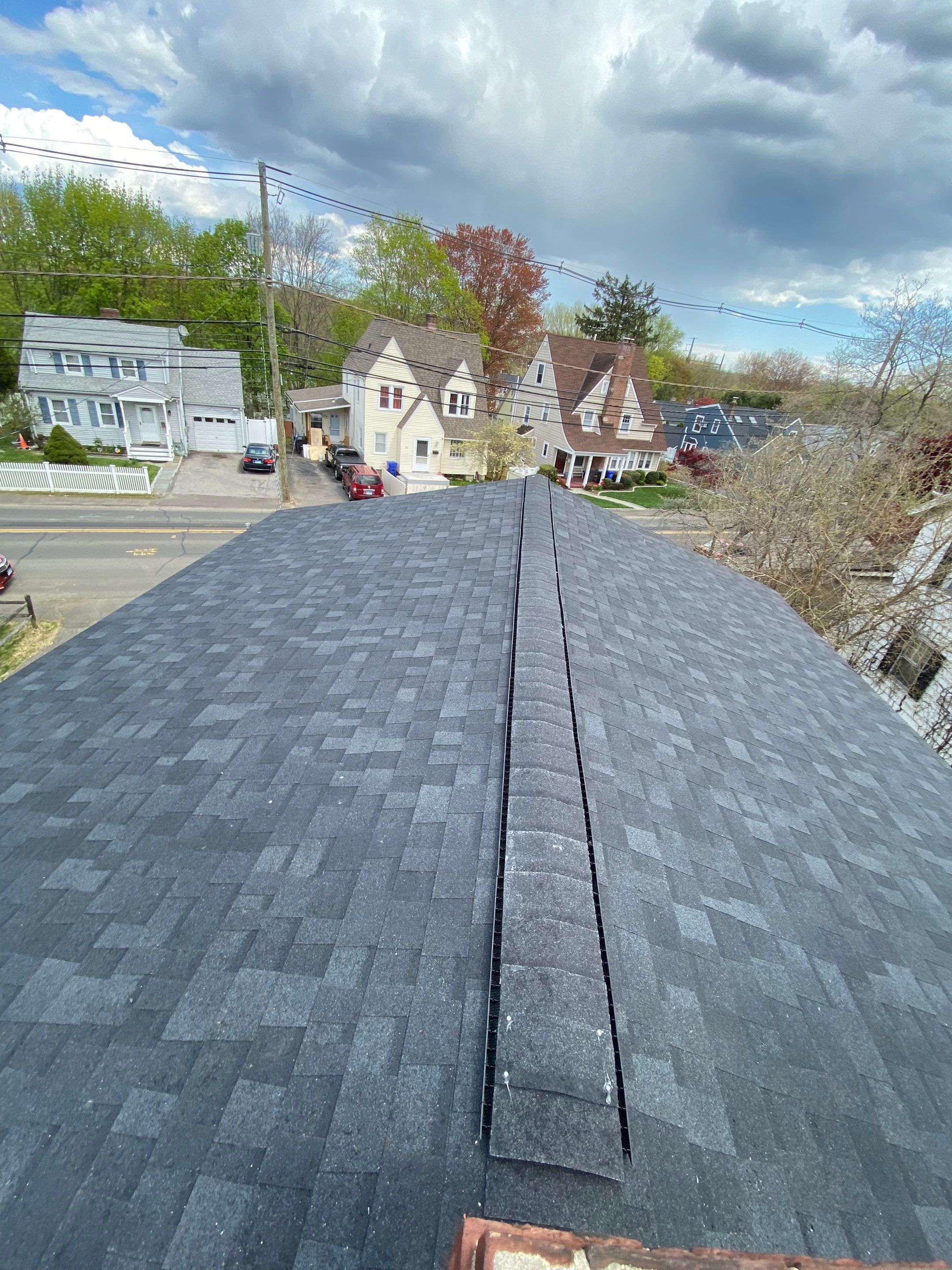 Charcoal Shingles by Reimagine Roofing