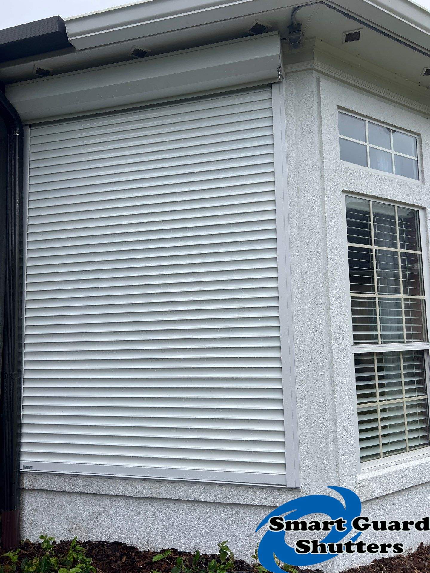 Rolling Shutters in White  by Smart Guard Shutters