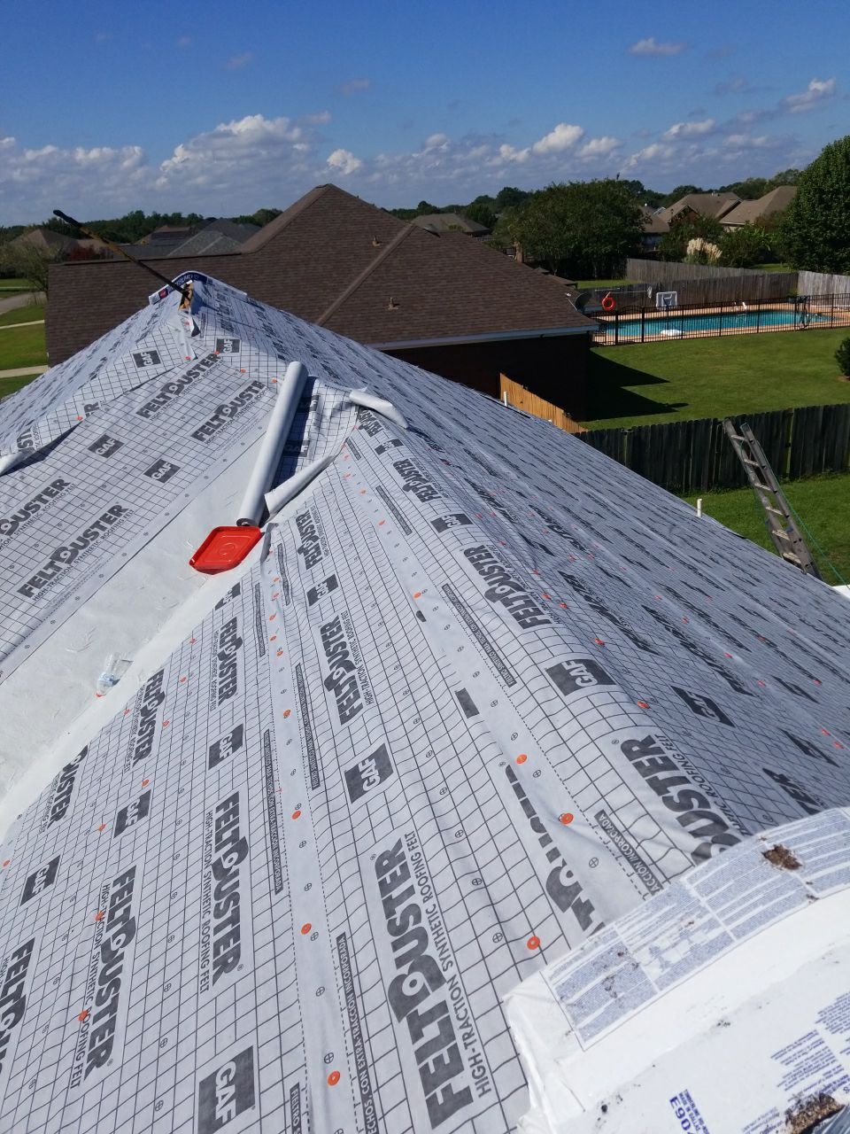 Residential Roofing Installation using Roof Replacement by American Roofing & Construction LLC