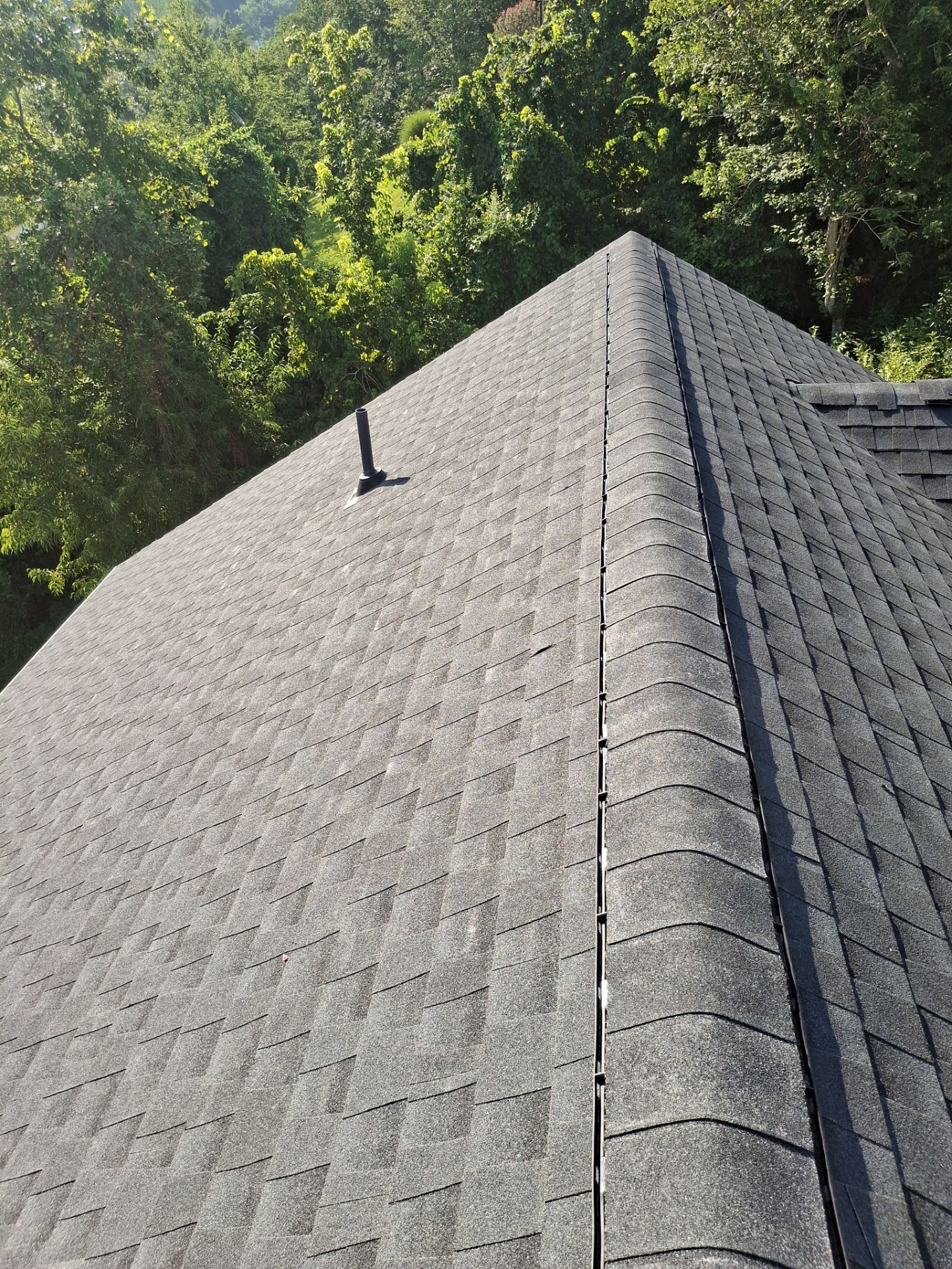 Residential Roofing Installation using GAF Timberline HDZ Charcoal by Rainstoppers Roofing