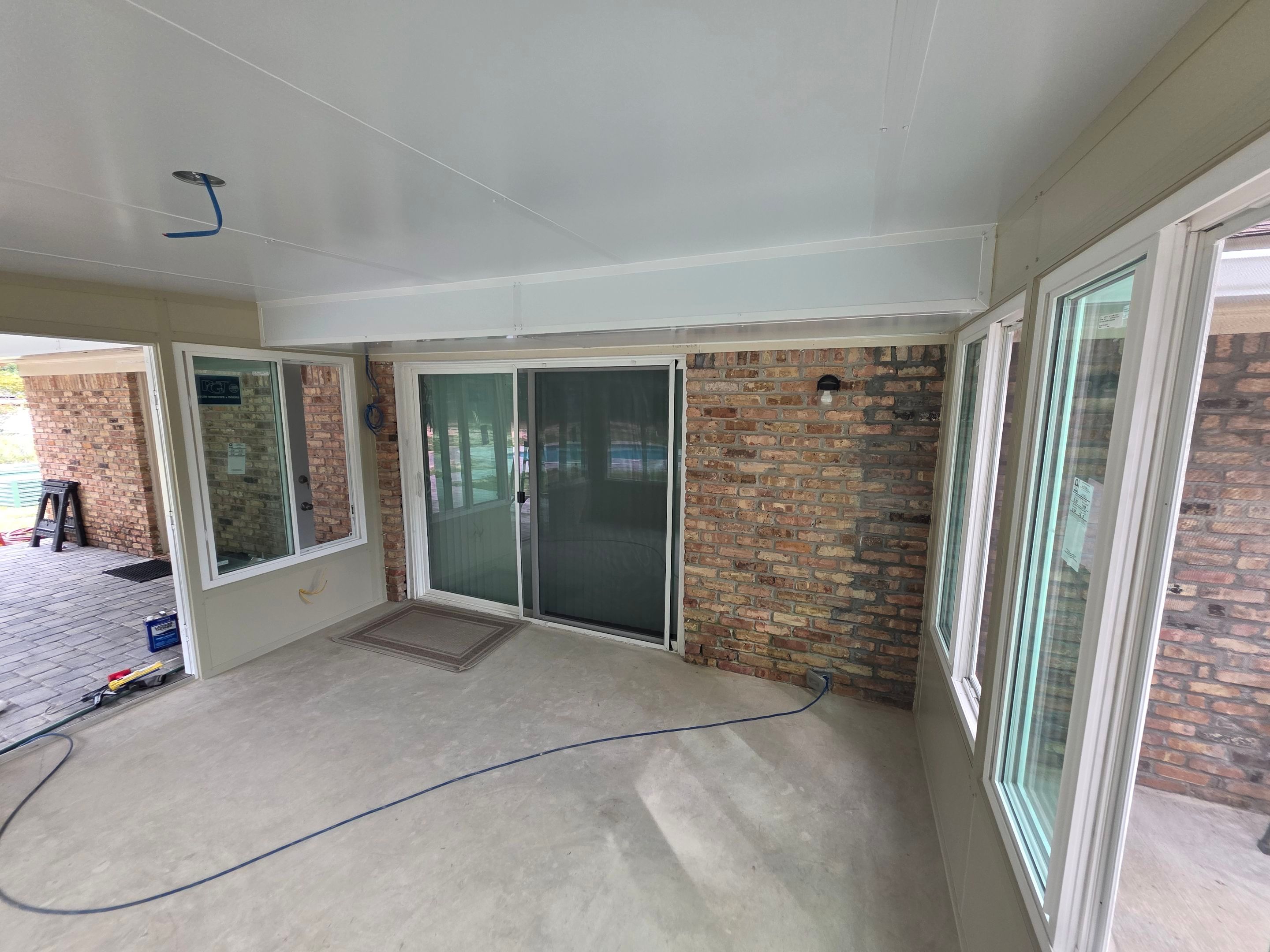Sunroom Addition and Covered Patio by Titan Sunrooms