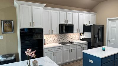 Cibolo Kitchen Refresh with Painted Cabinets, Quartz Countertops & Herringbone Backsplash