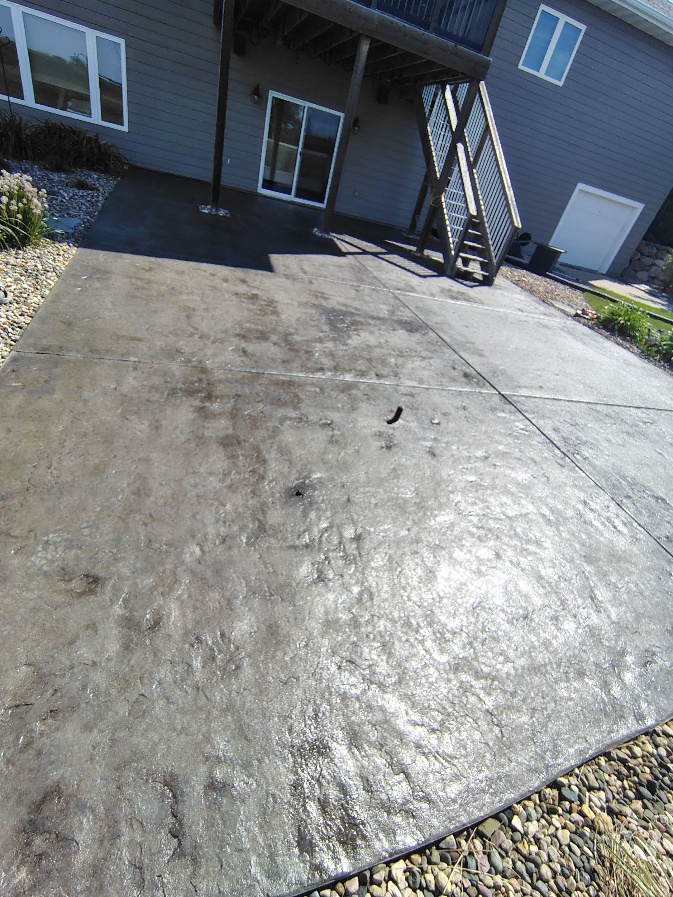 Concrete Patio Restoration and Installation in Sioux Falls by Select Painting, Coatings & Garage Cabinets