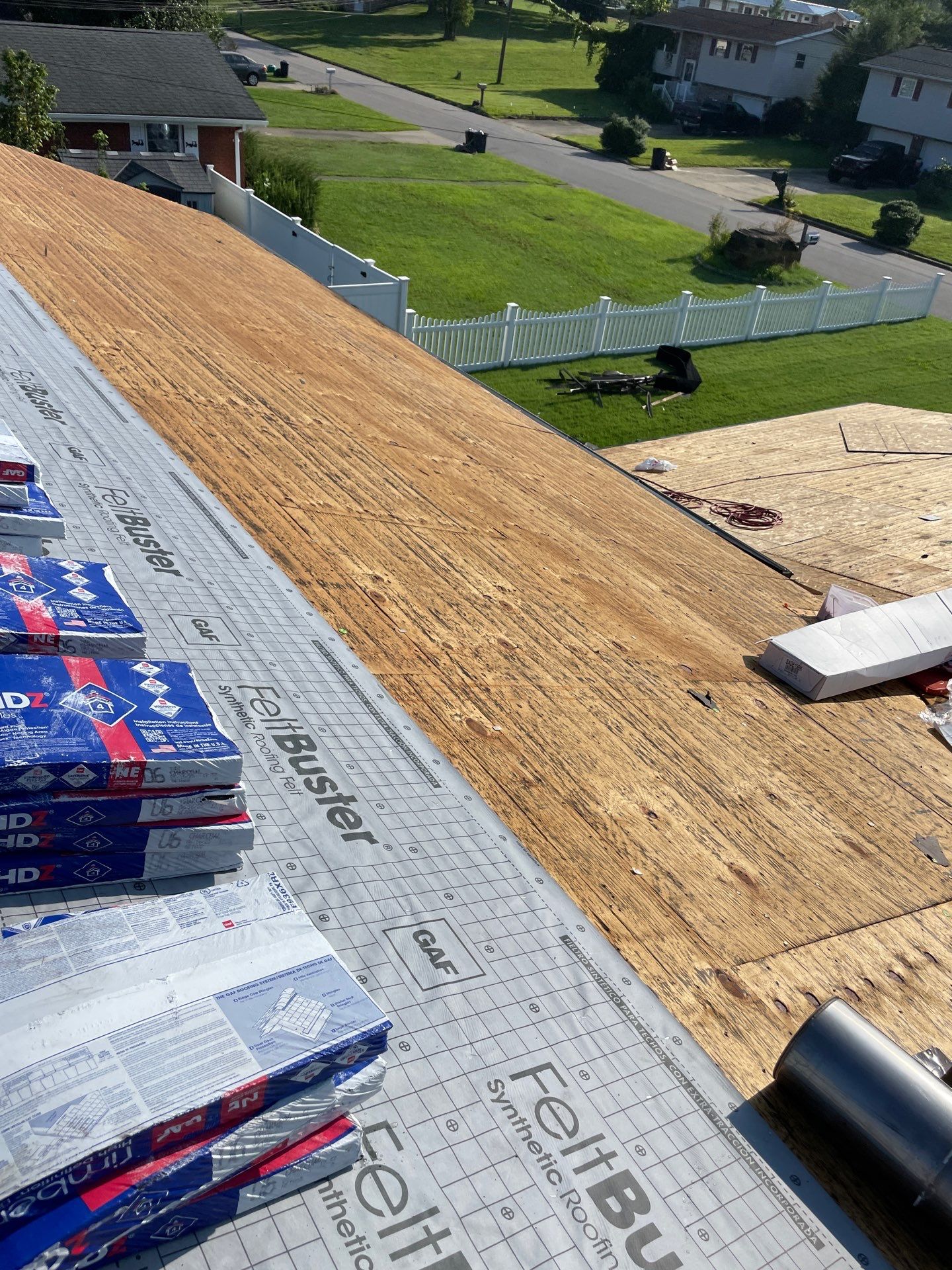 Residential Roofing Installation using GAF Timberline HDZ Charcoal by Rainstoppers Roofing