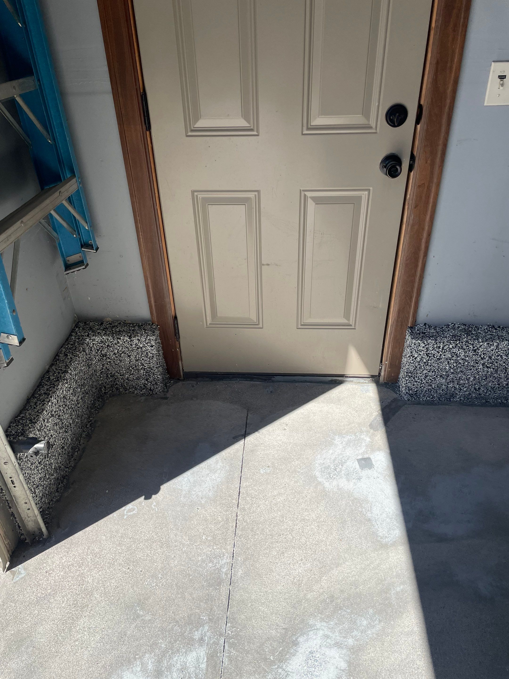 Residential Garage Floor Coating in Sioux Falls by Select Painting, Coatings & Garage Cabinets