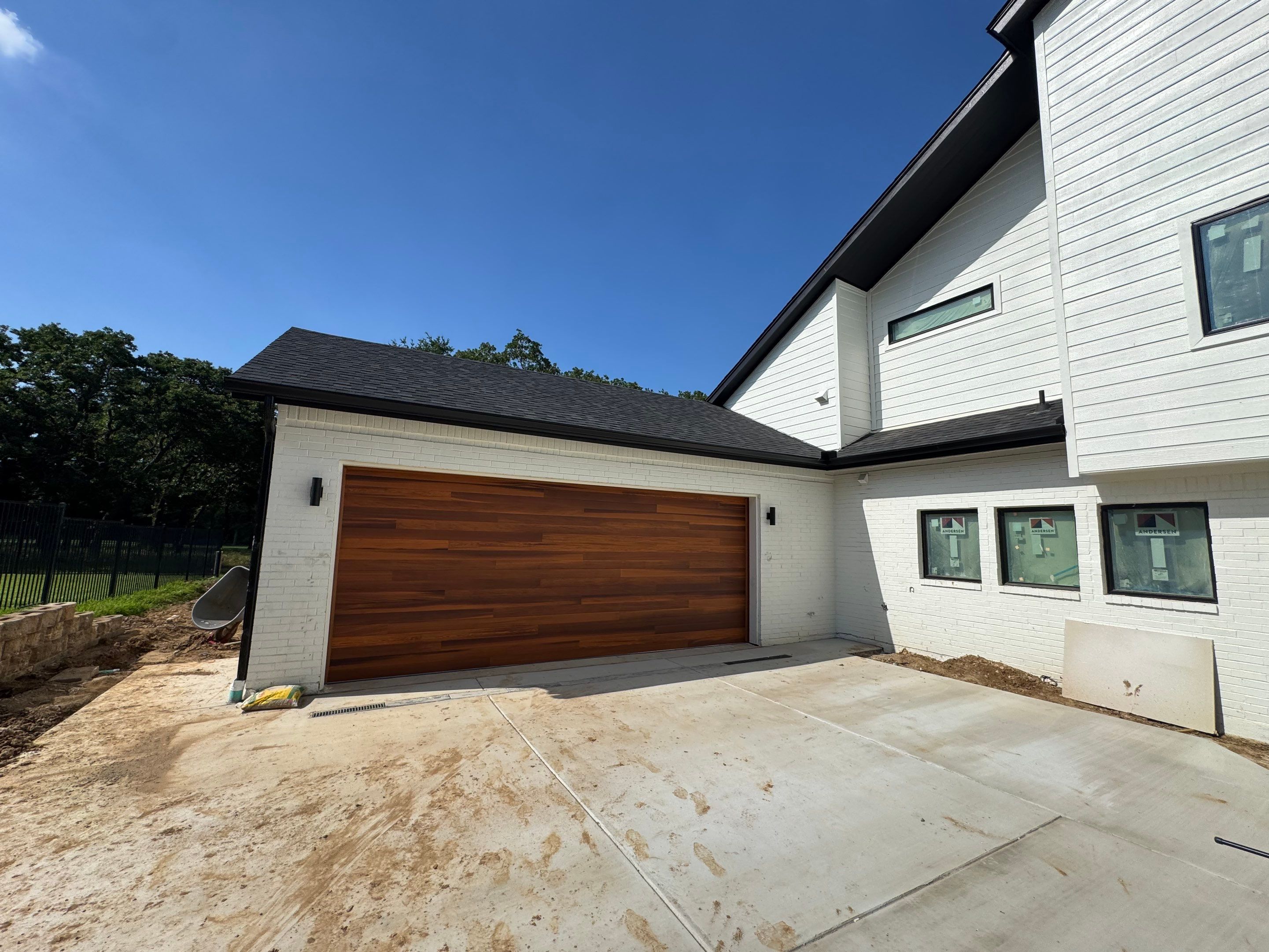 Modern CHI Cedar Garage Door and LiftMaster Opener in Trophy Club by Meadows Garage Doors