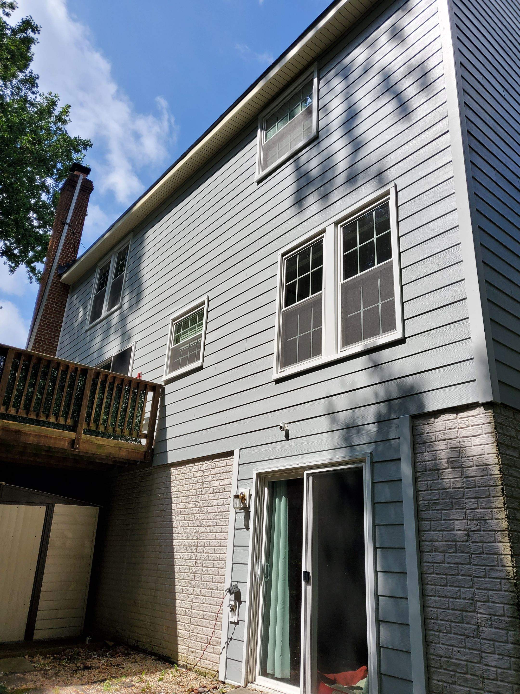 Exterior Home Makeover using GAF Timberline HDZ, GAF Decotech, and James Hardie Siding by American Home Contractors
