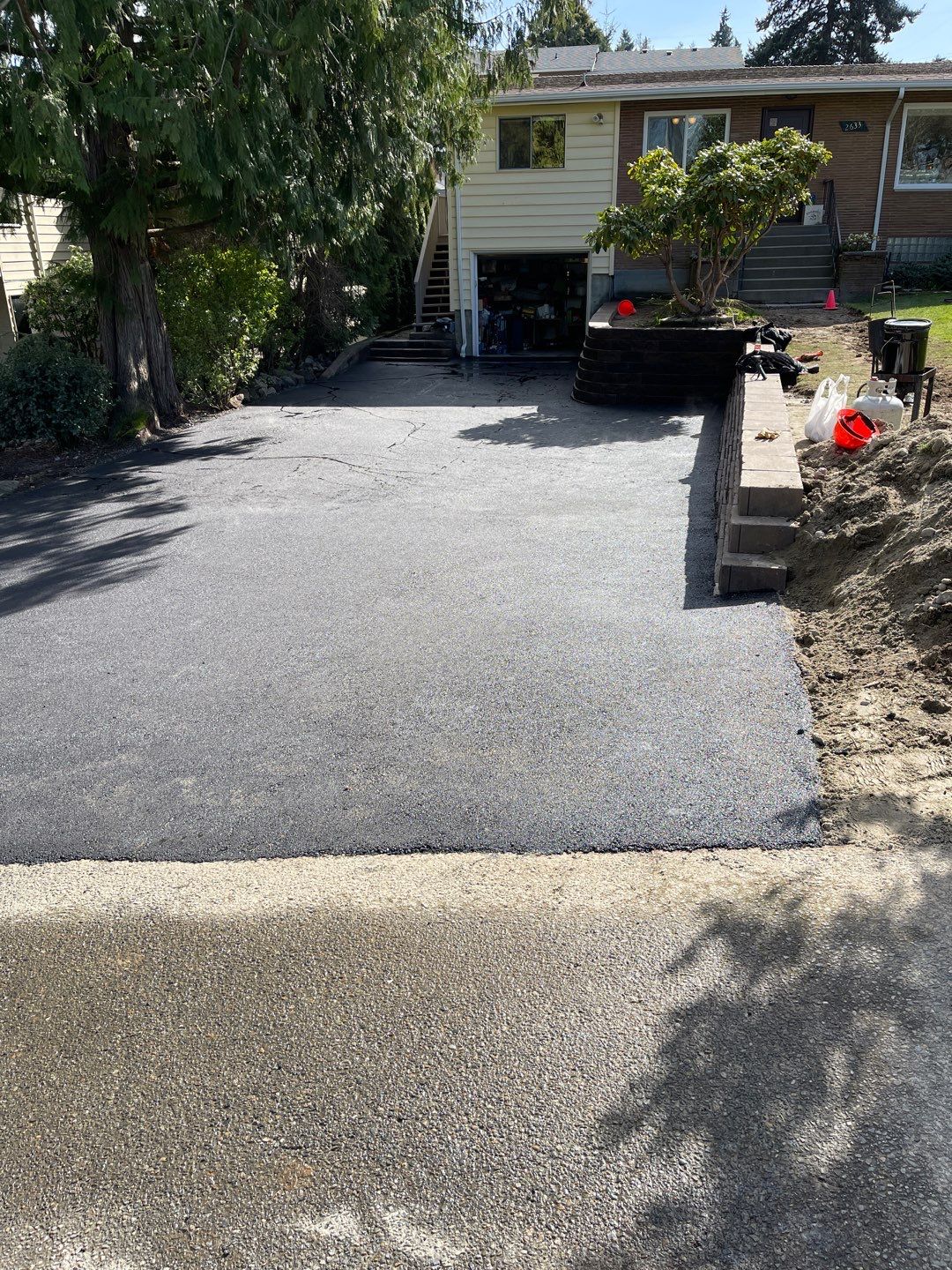 Lorra | Asphalt Driveway Repair & Retaining Wall by Jireh Asphalt & Concrete Inc 