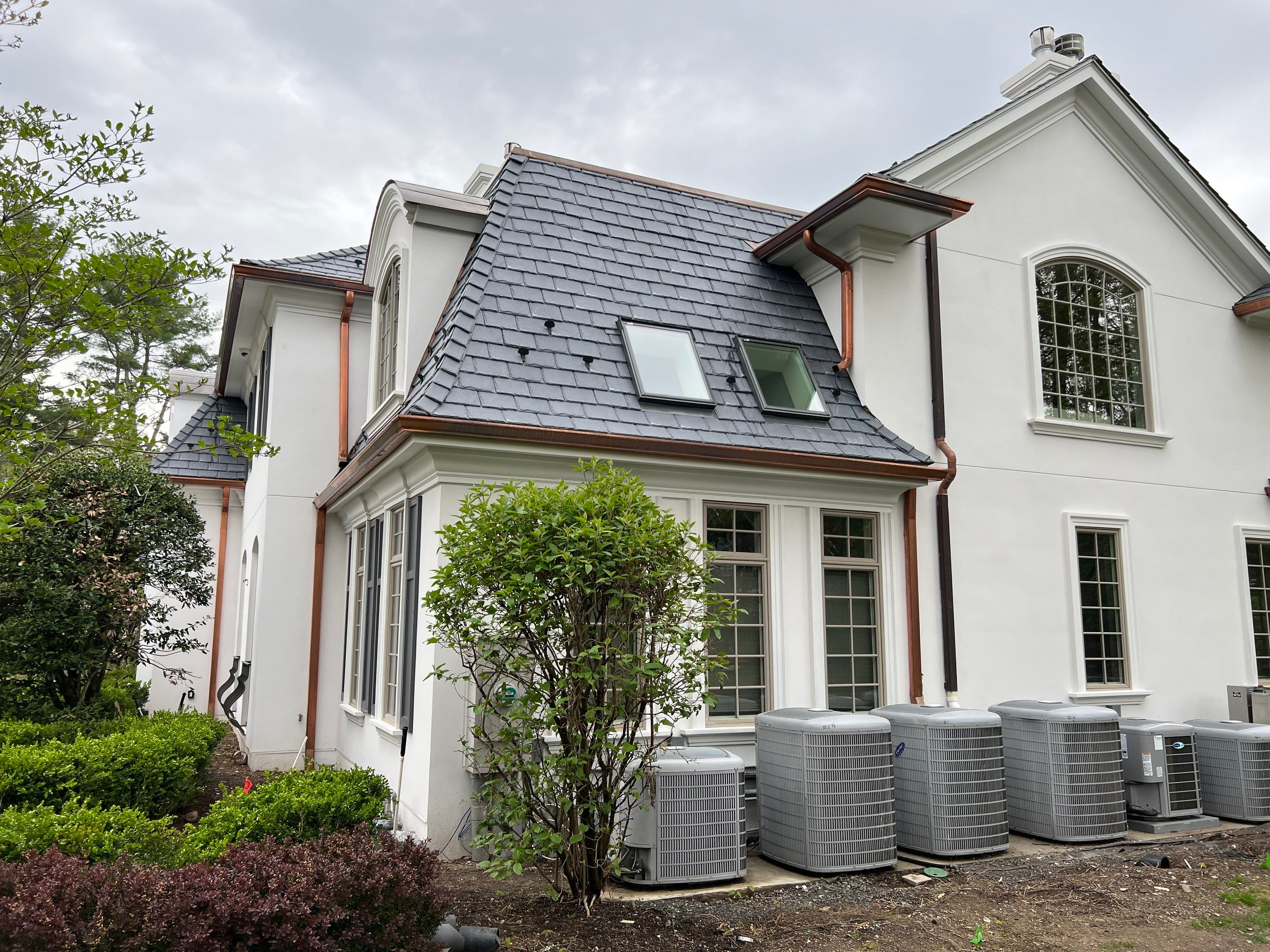 Full Slate - Stucco - Copper Remodel by USA Roof Masters