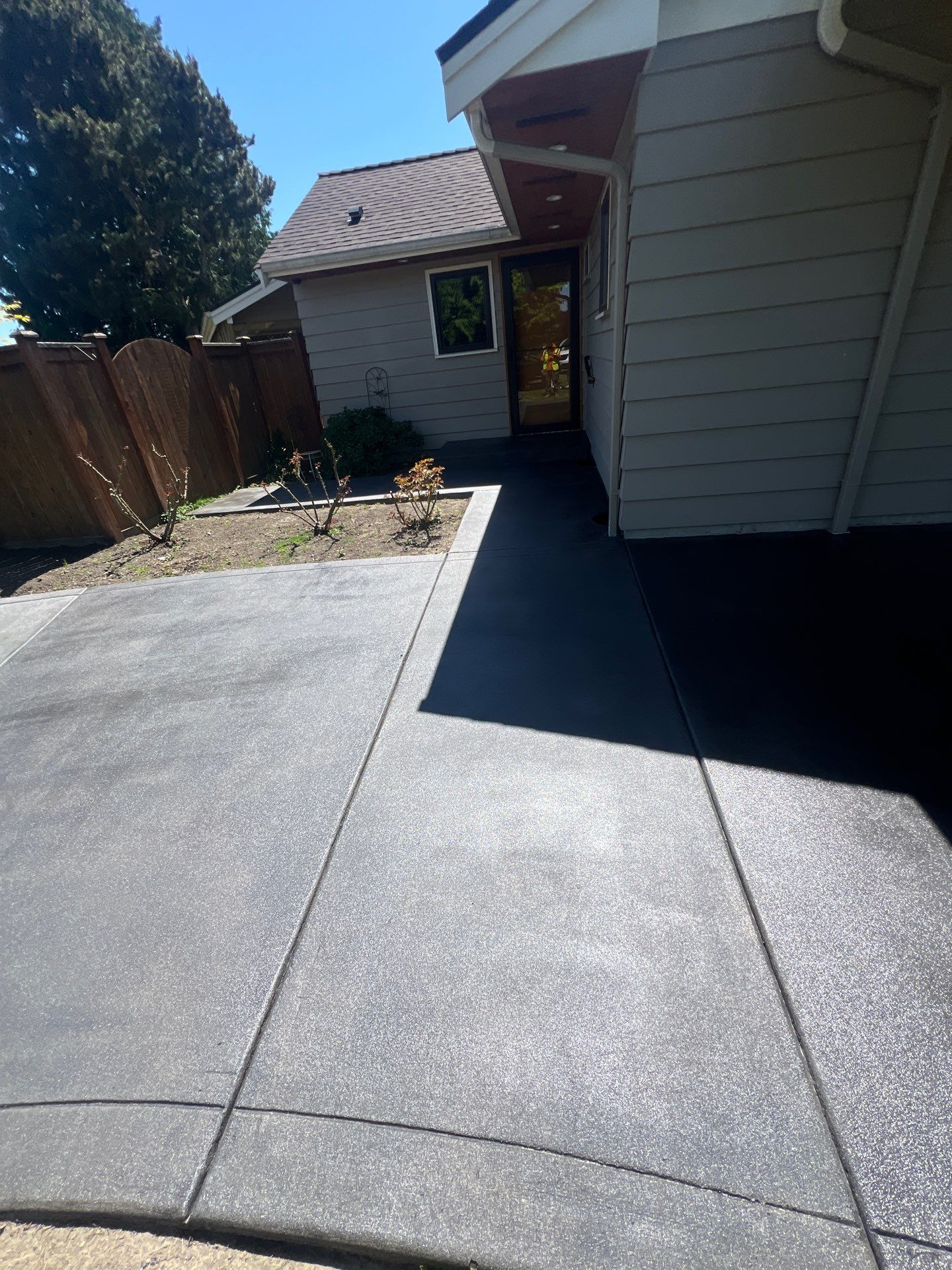 Colored Concrete Driveway Repair with Sealer| Everett    by Jireh Asphalt & Concrete Inc 