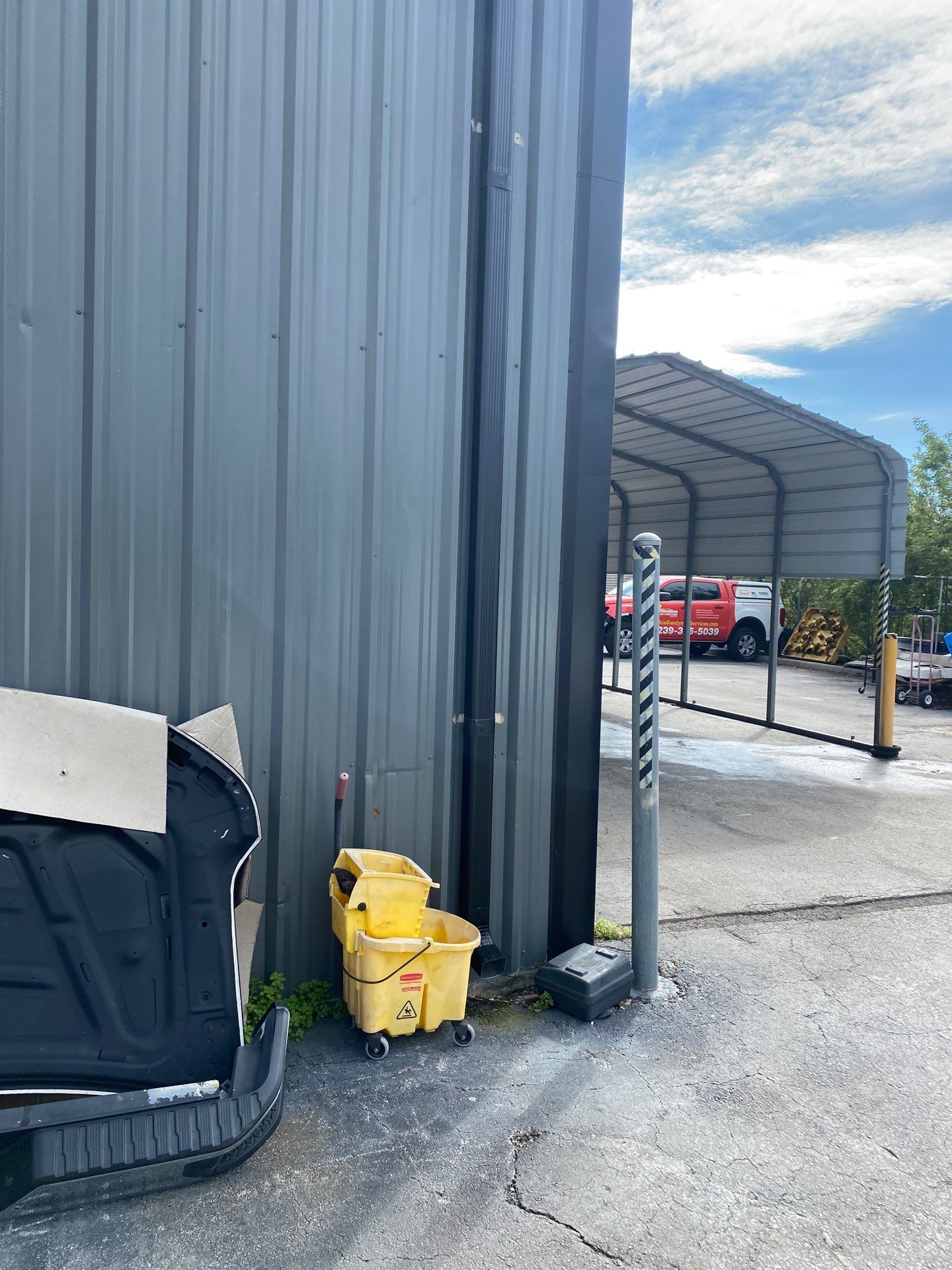 Commercial Black Gutters and Downspouts in Bonita Springs, FL by Gutter Professors