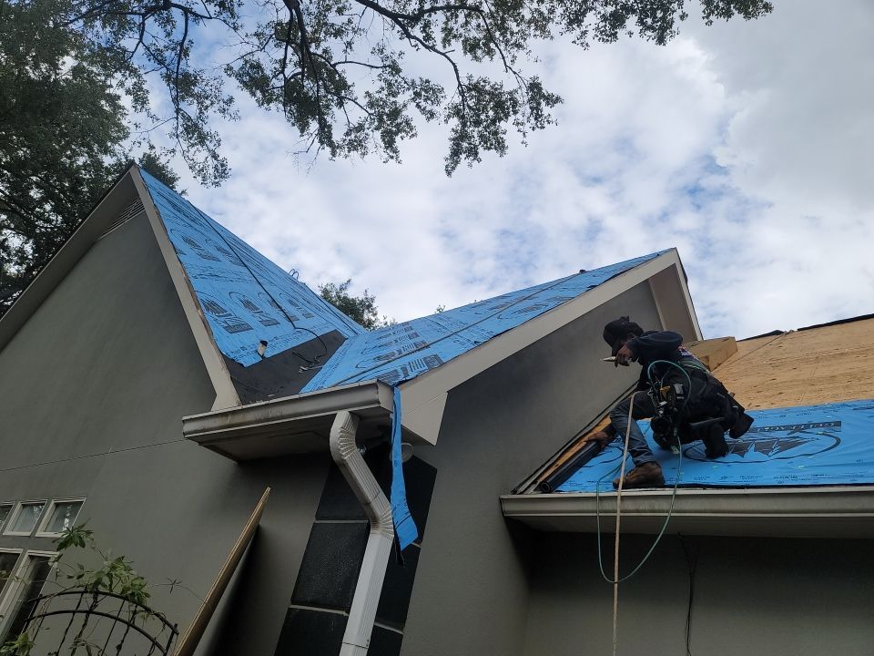 Residential Roofing Installation using Roof Replacement by American Roofing & Construction LLC