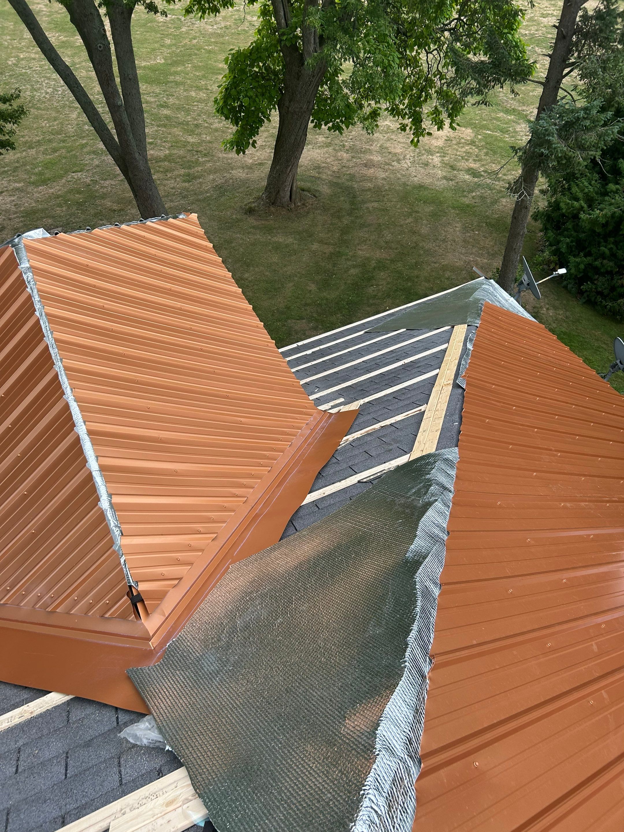 Residential Roofing Installation using Performance Panel Metal - Copper Metallic by RoofX 