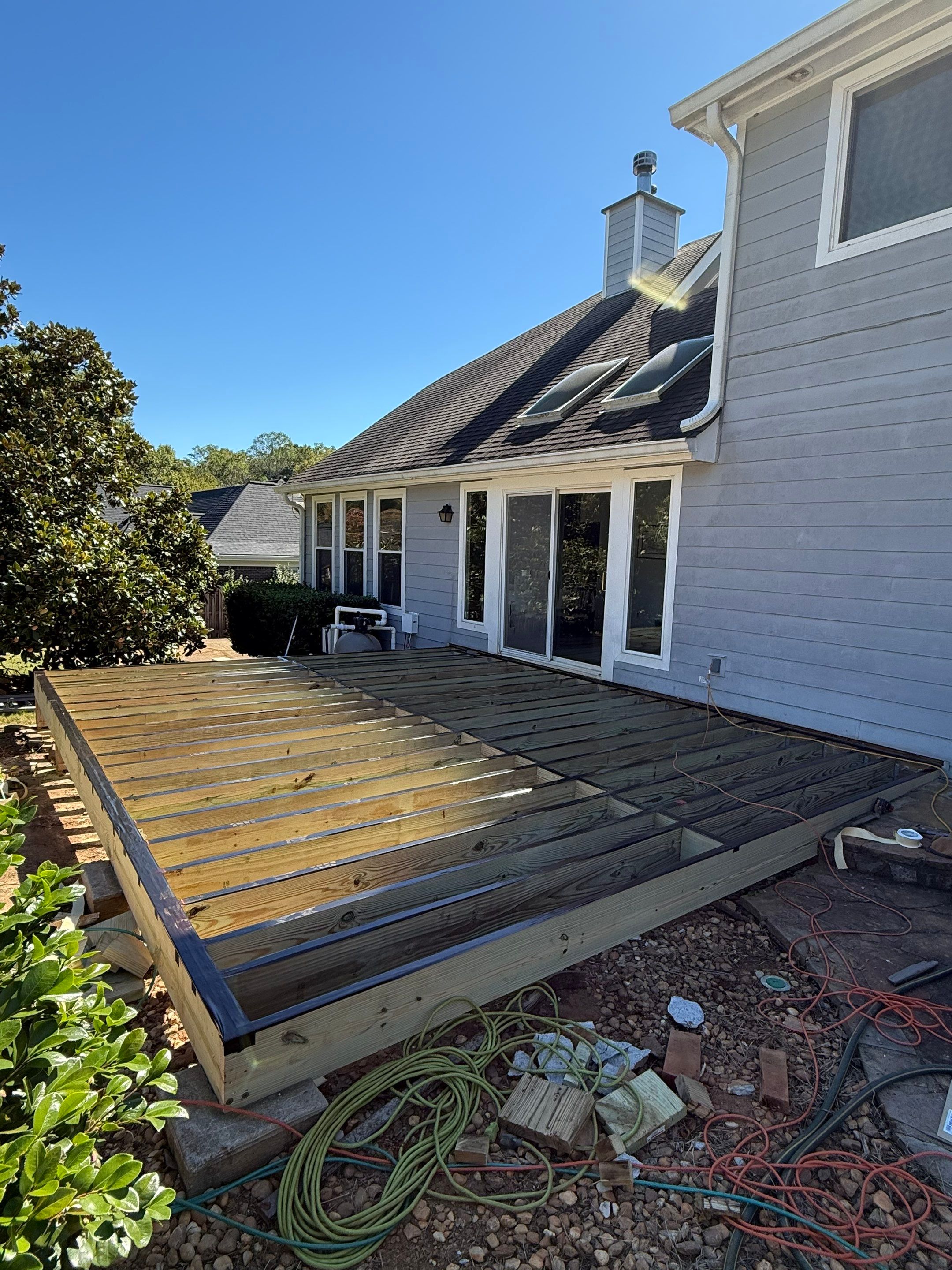 Custom Composite Deck with Integrated Seating in Roswell by Swift Home Renovations