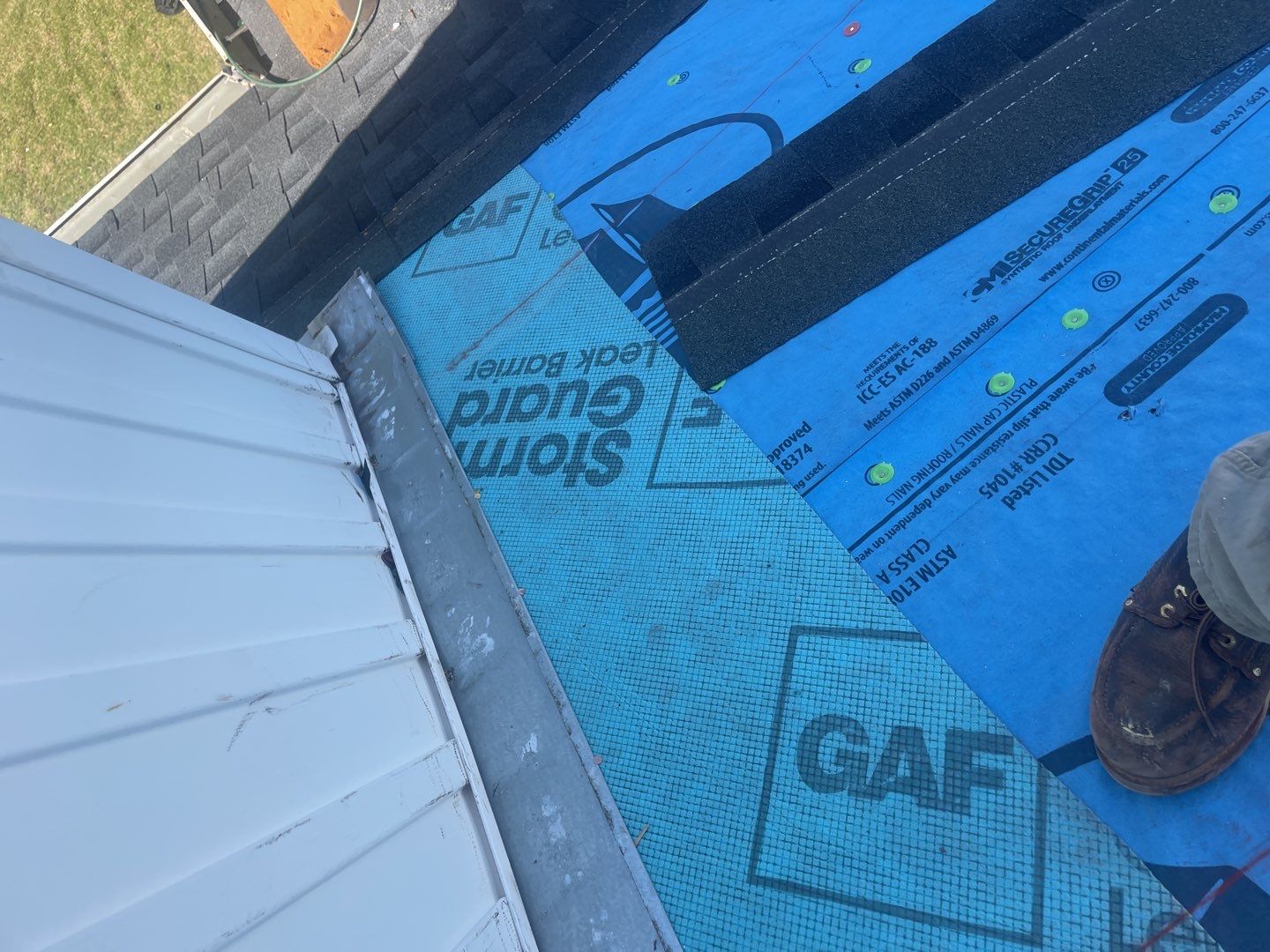 Residential Roofing Installation using Roof Replacement by American Roofing & Construction LLC