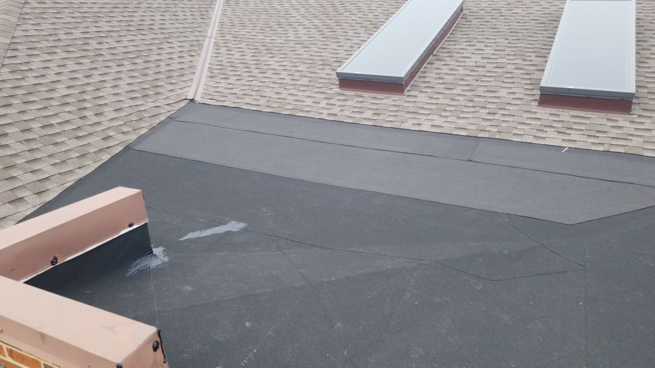 Skylight removal and install  by Absolute Roofing and Construction