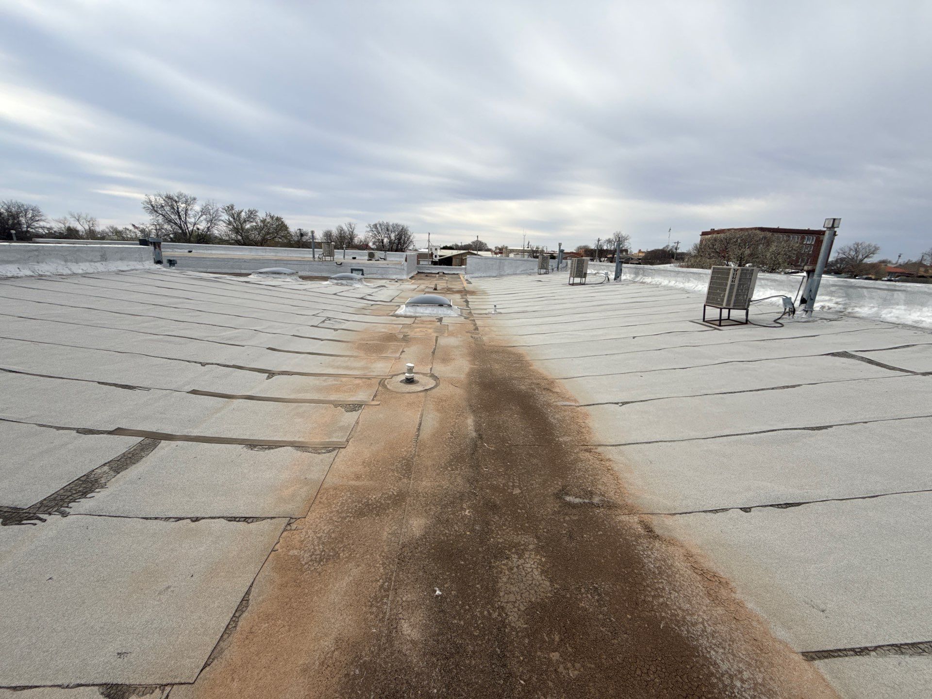 Hollis High School Comprehensive TPO Roof Replacement and Restoration by Secondary Rhodes