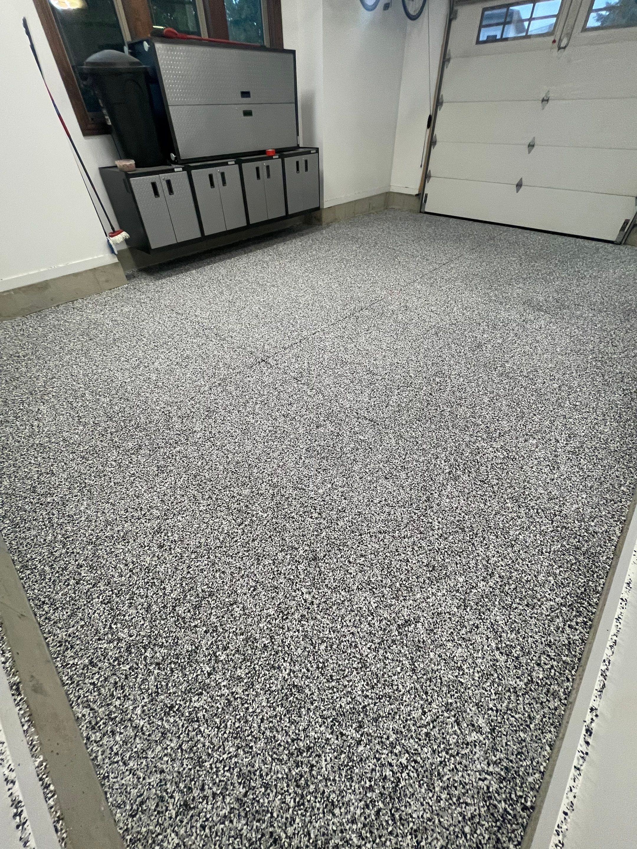 Garage Floor Coating and Domino Flake Finish in Sioux Falls by Select Painting, Coatings & Garage Cabinets