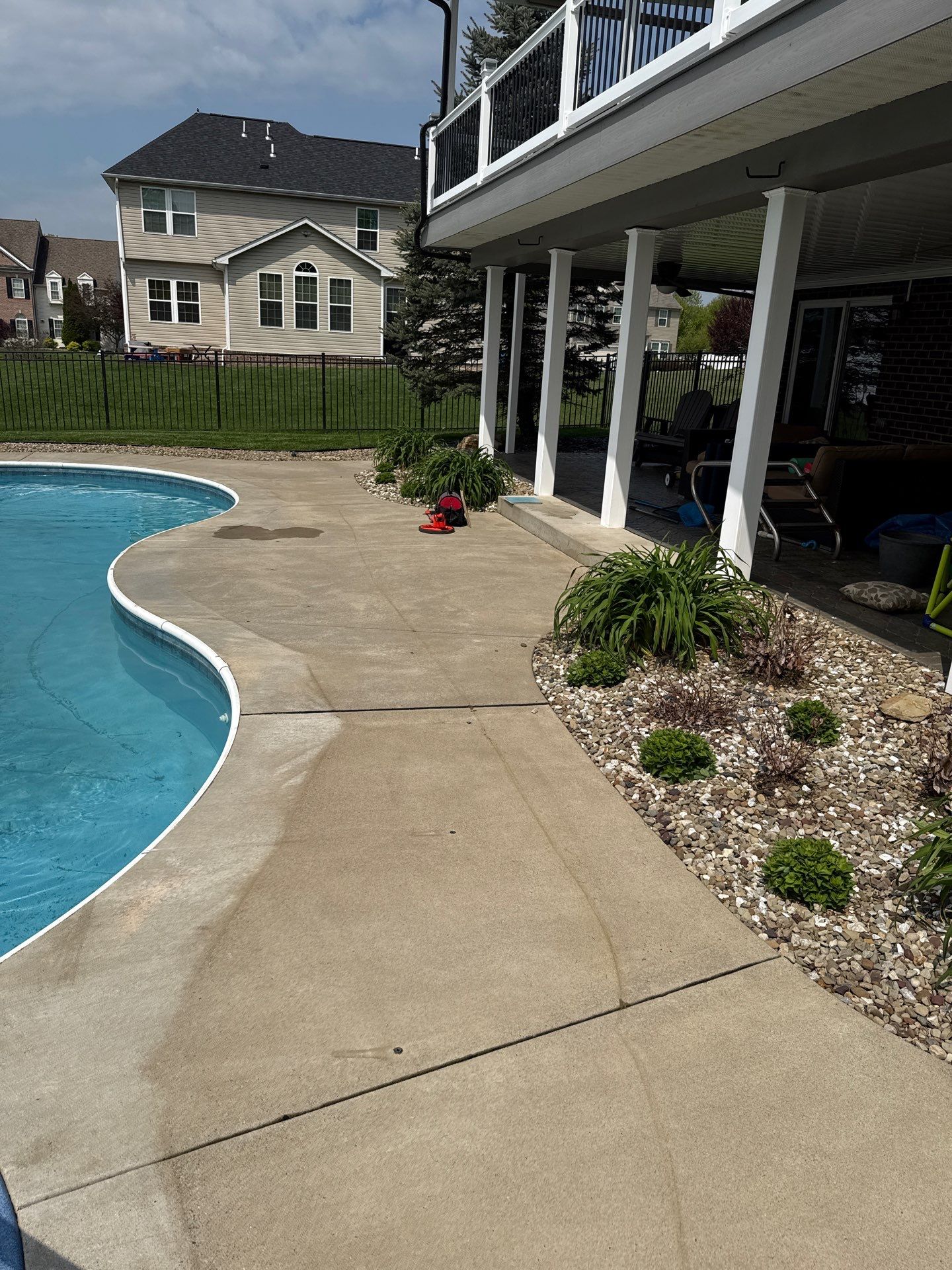 Twilight Pool Deck / Patio Project in Beaver falls by Floors in a Day, Inc