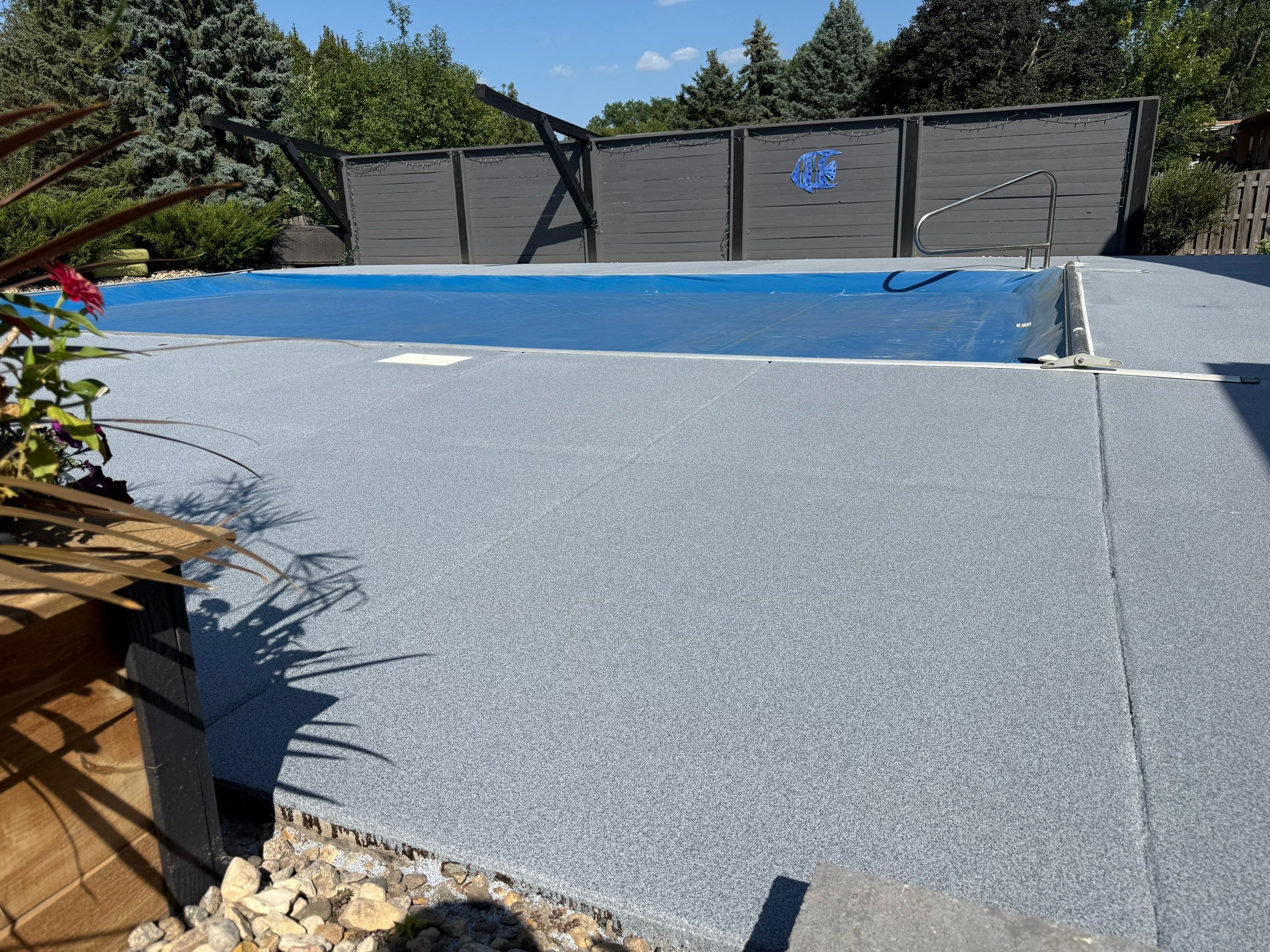 Garage Floor and Textured Pool Deck Coating in Sioux Falls by Select Painting, Coatings & Garage Cabinets