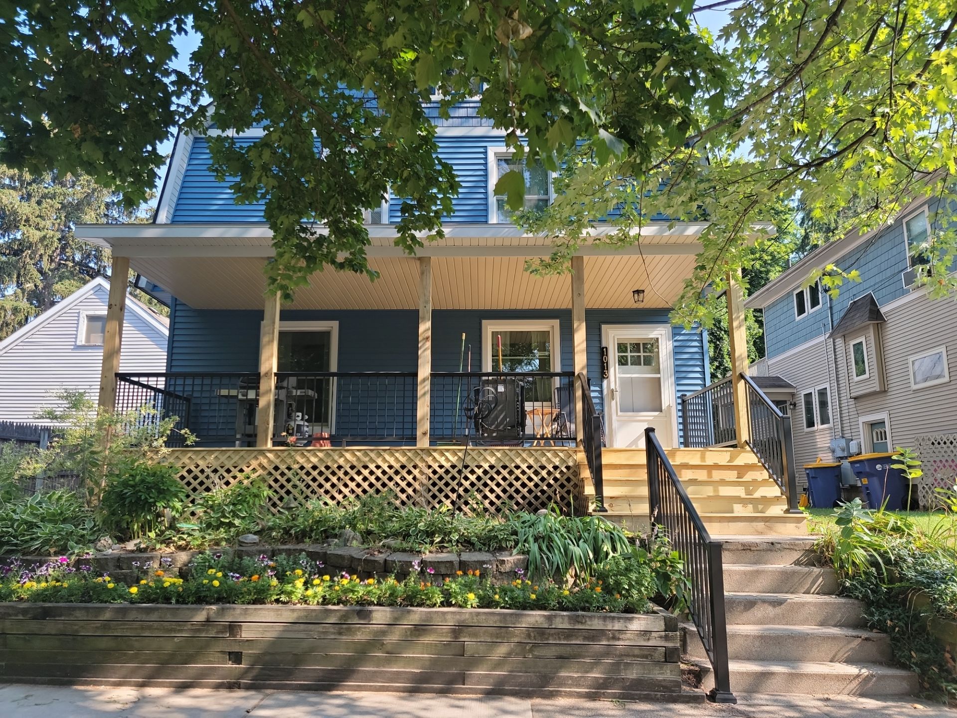 SIDING, DECK AND NEW PORCH  by Avalon Roofing and Exteriors