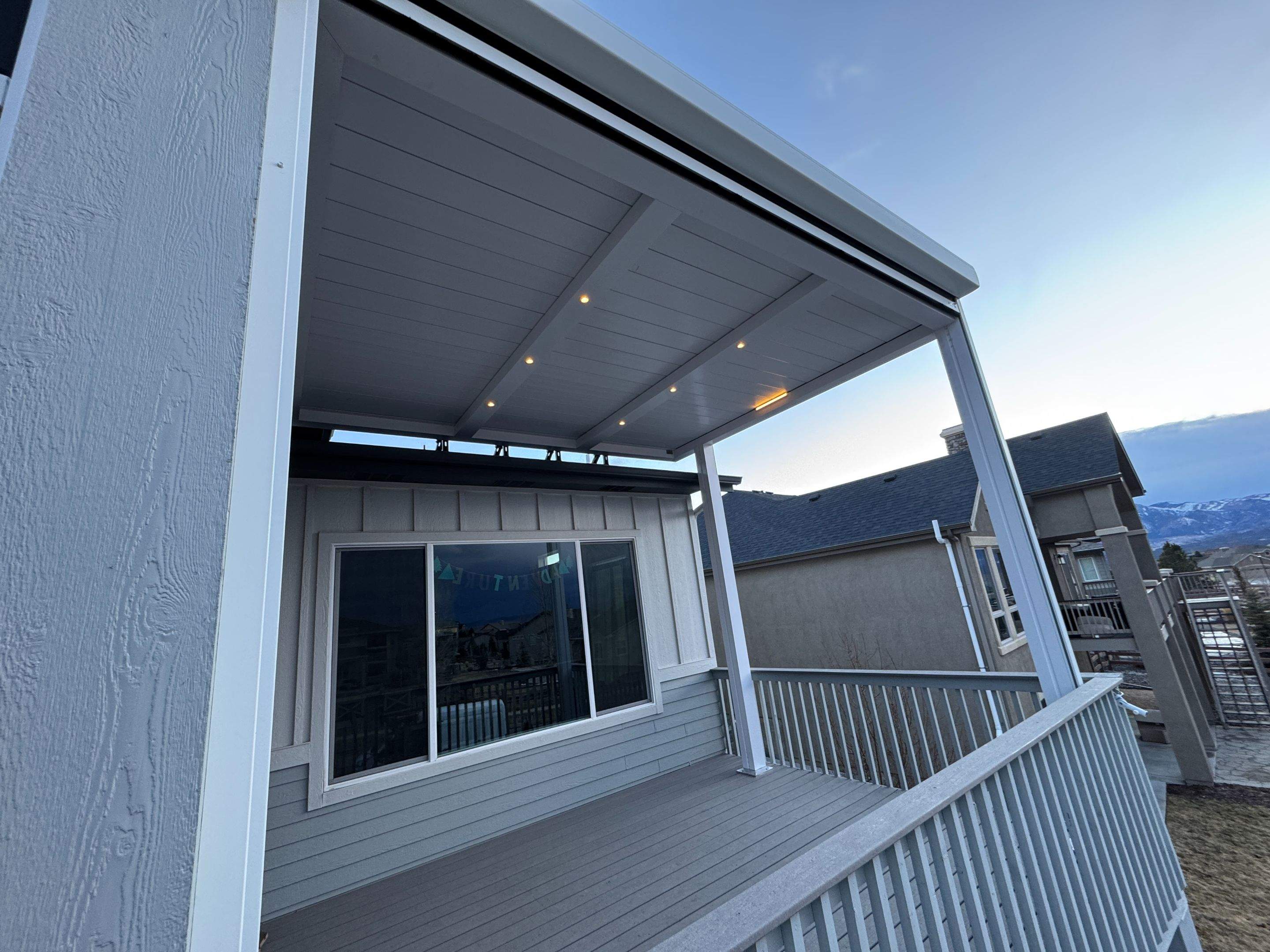 Aluminum Pergola using Azenco Outdoor with Motorized Exterior Screens by Outdoor Solutions Colorado