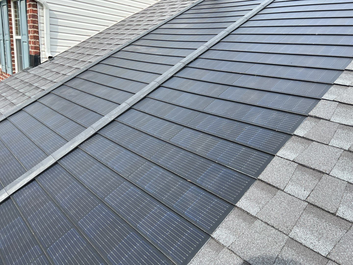 Solar Roof Replacement using GAF Timberline Solar Shingles by American Home Contractors