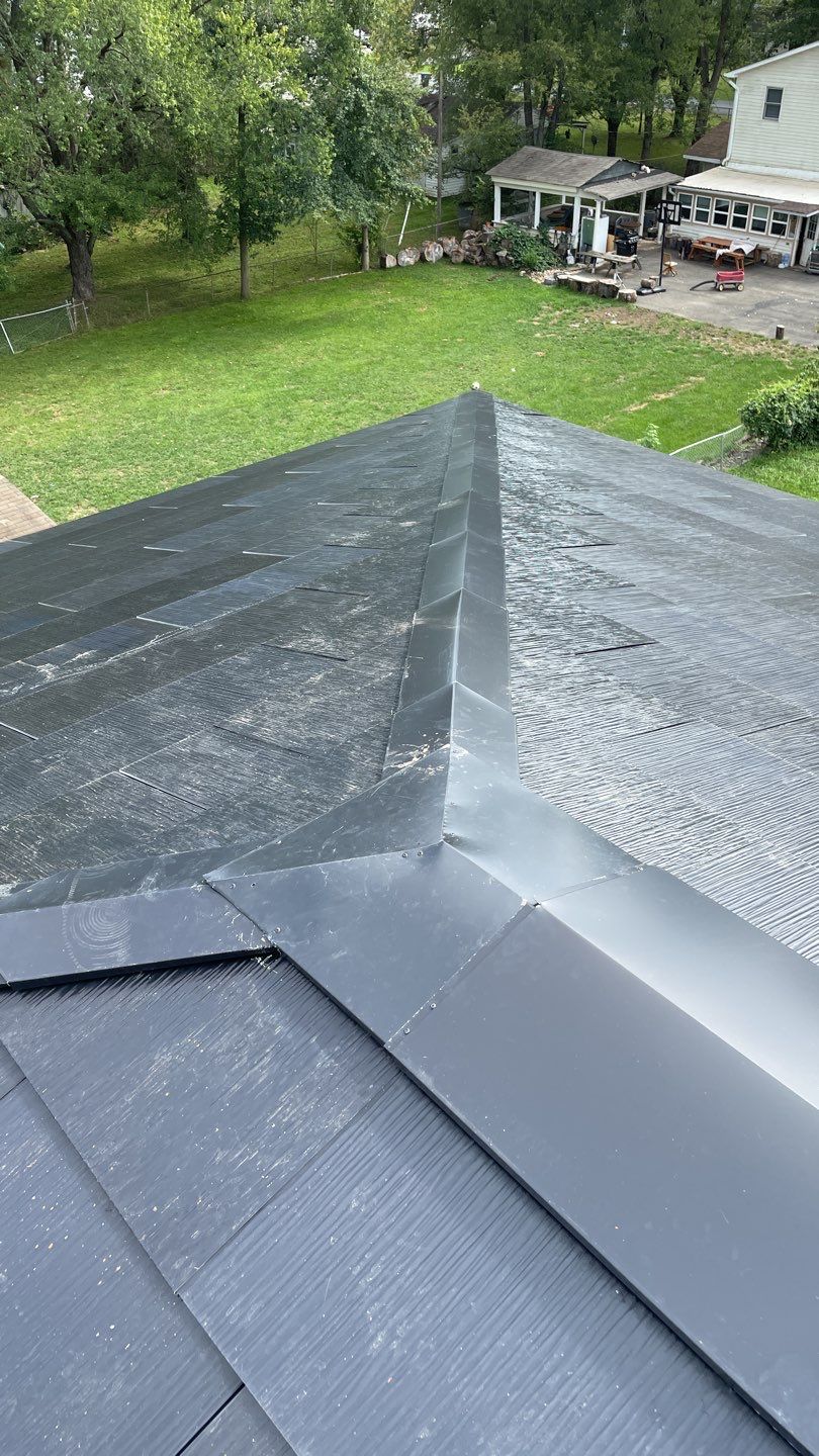 Tesla Solar Roof  using Tesla Solar Roof V3 tiles by American Home Contractors