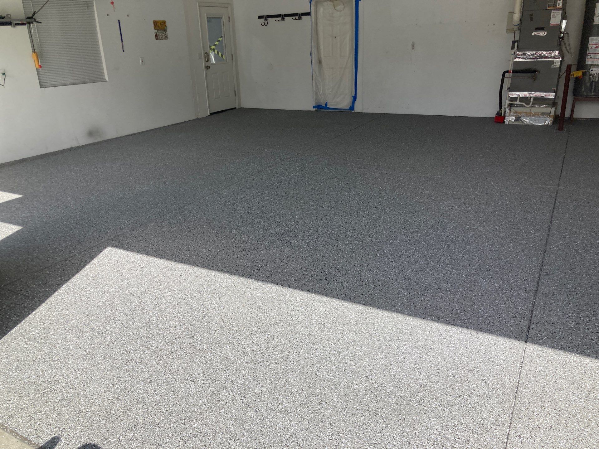 Garage Transformation using Slate Hybrid by Croc Coatings, LLC