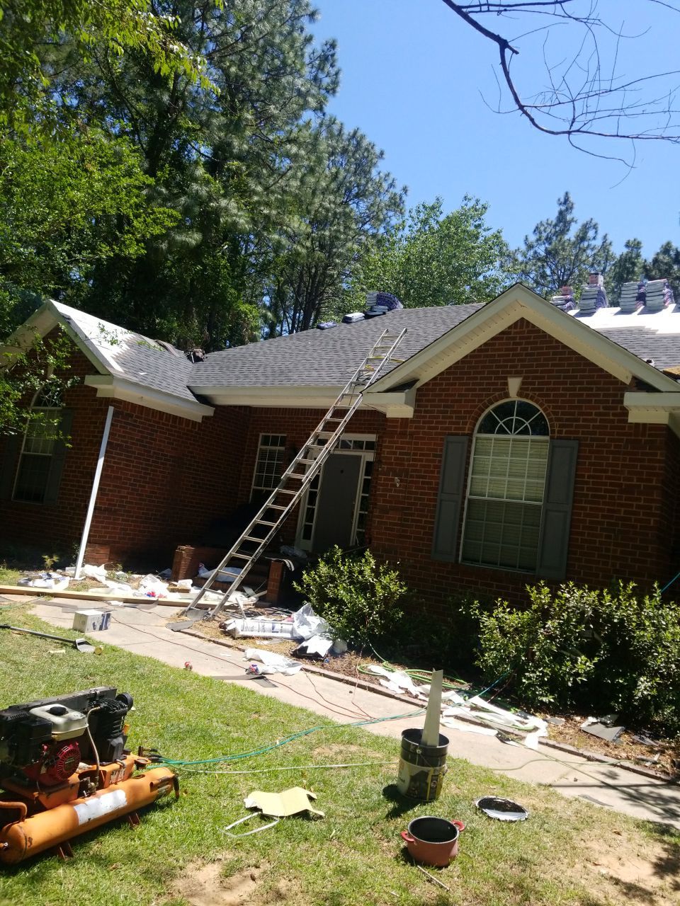 Residential Roofing Installation using Roof Replacement by American Roofing & Construction LLC