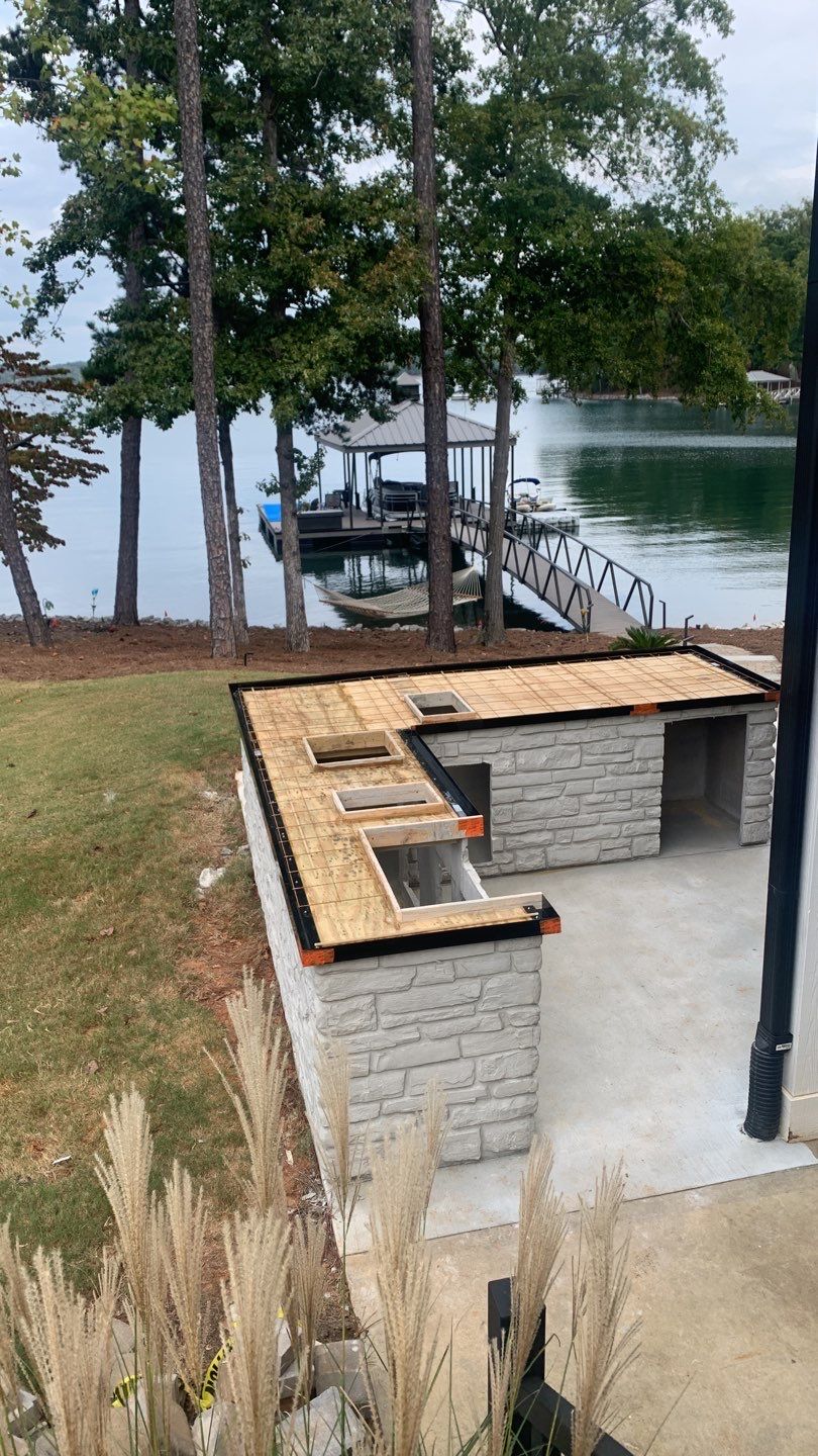 Outdoor Kitchen on Lake Keowee by Xtreme Concrete Services